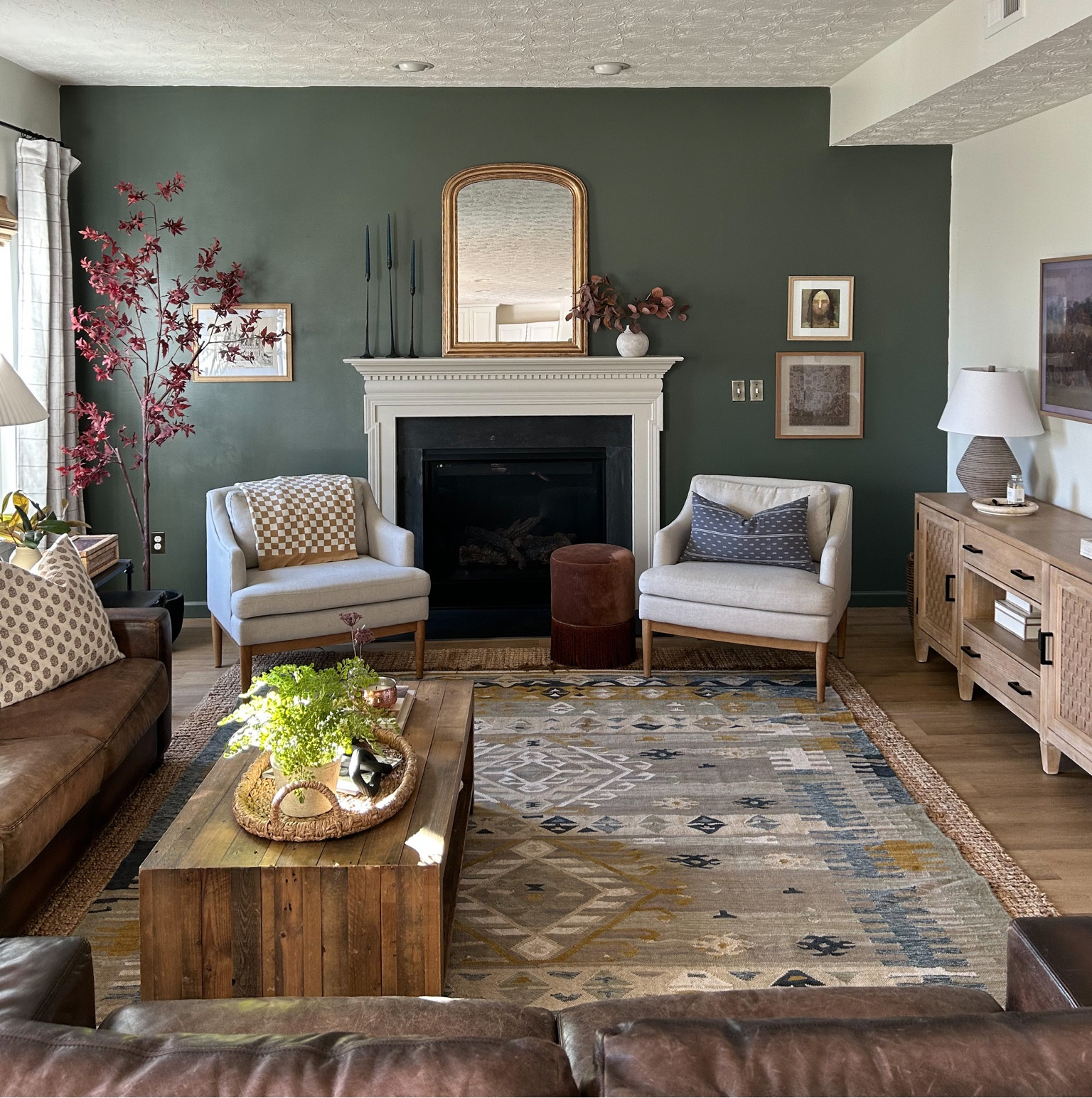 Cozy autumn living room with a sherwin williams pewter green accent wall.

#LTKhome #LTKsalealert #LTKSeasonal