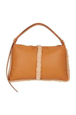 Faux Shearling Puffin Bag
                    
                    Simon Miller | Revolve Clothing (Global)