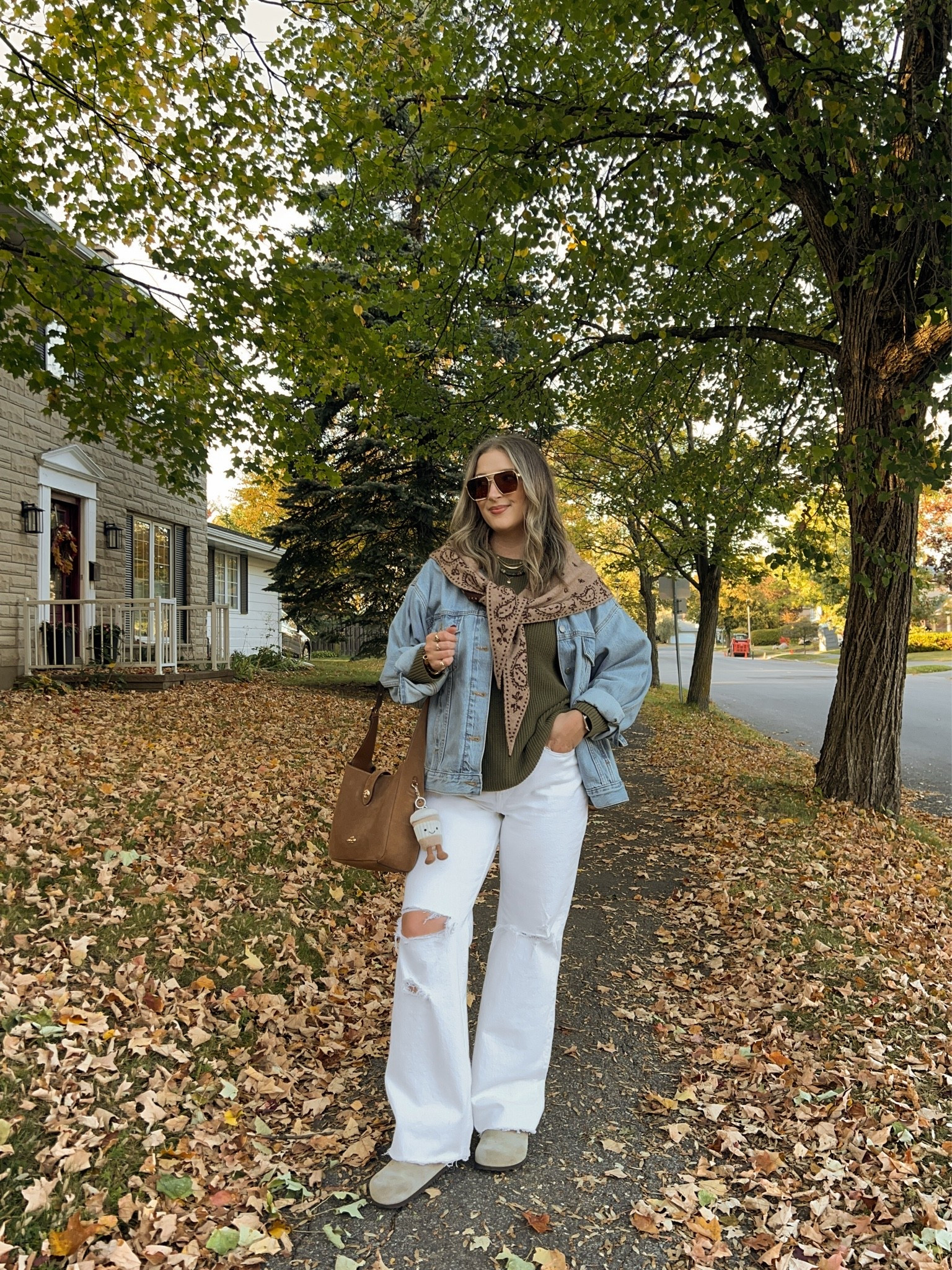 Casual fall outfit! Wearing size 30 in the white jeans. Wearing size L in the olive green sweater (Canadian link under “similar products”). Sized up to XL in the denim jacket for an oversized fit. I’m a 9.5-10 shoe and wear a 40 in the Birkenstocks. Scarf is low stock so I linked a bunch similar