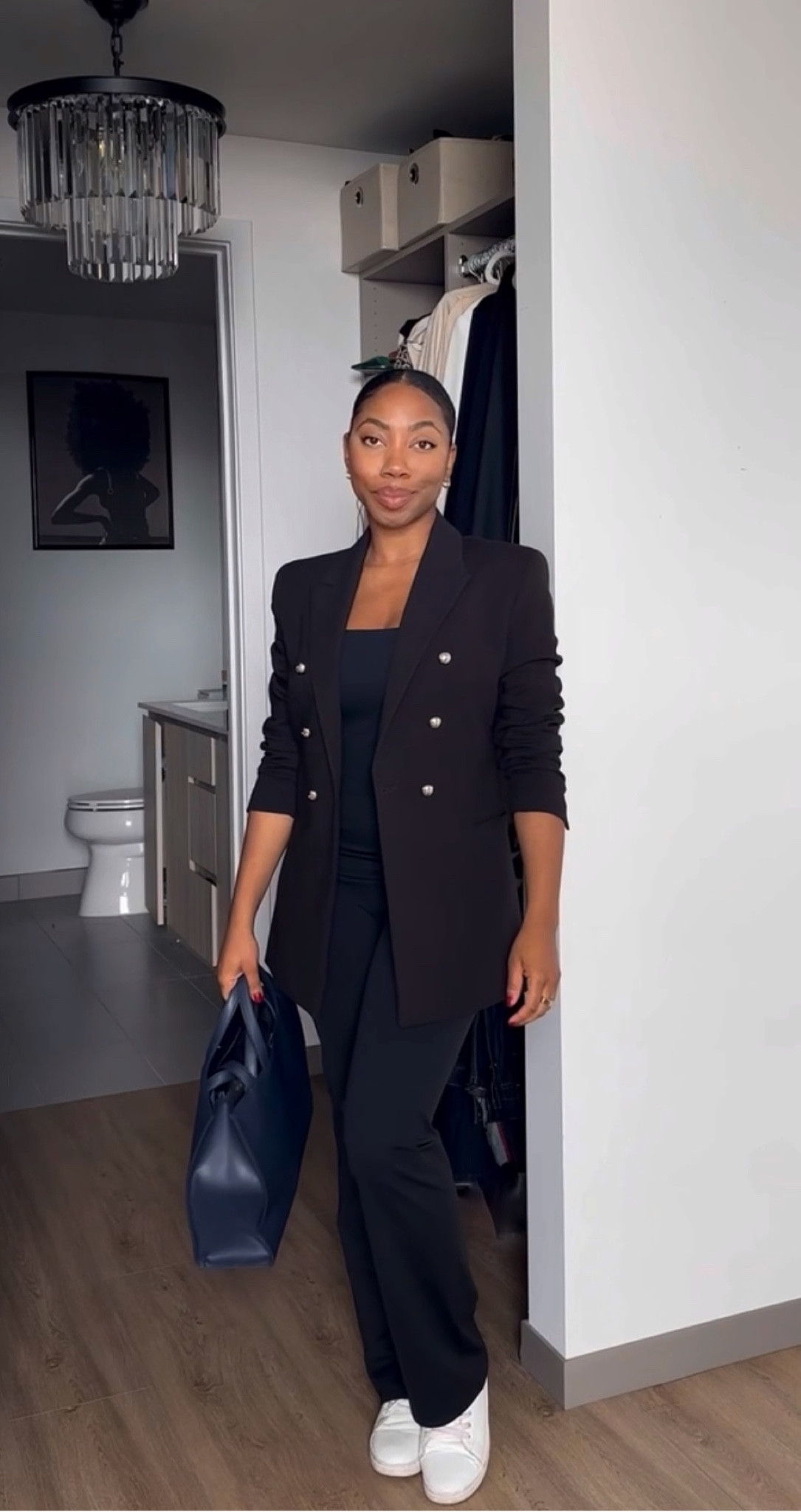 Black jumpsuit by spanx called the Booty Boost® Active Flare Jumpsuit. I’m wearing a size Medium ✨💞