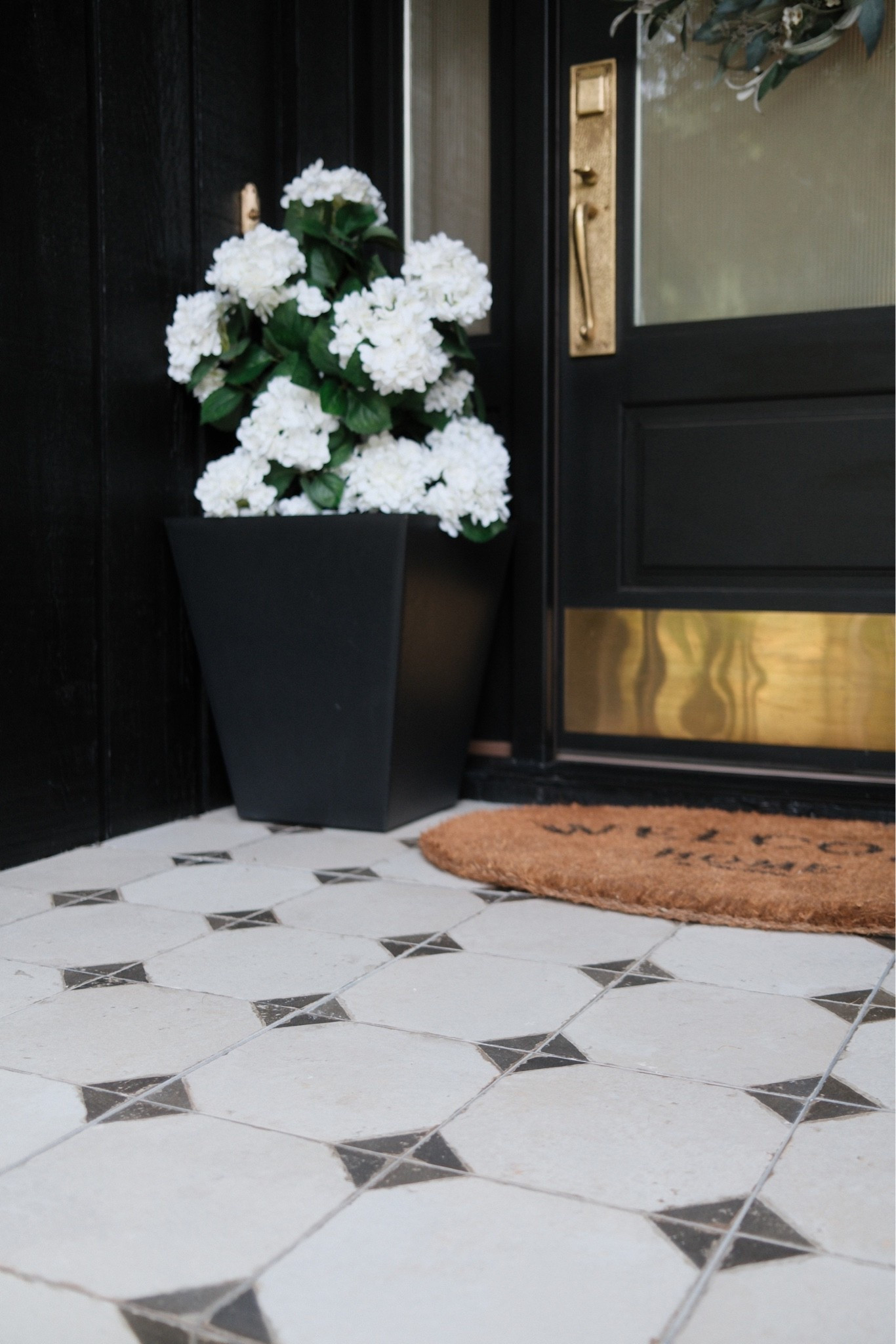 Loving our front porch tile we did still 🫶🏻

#LTKSeasonal #LTKHome #LTKActive