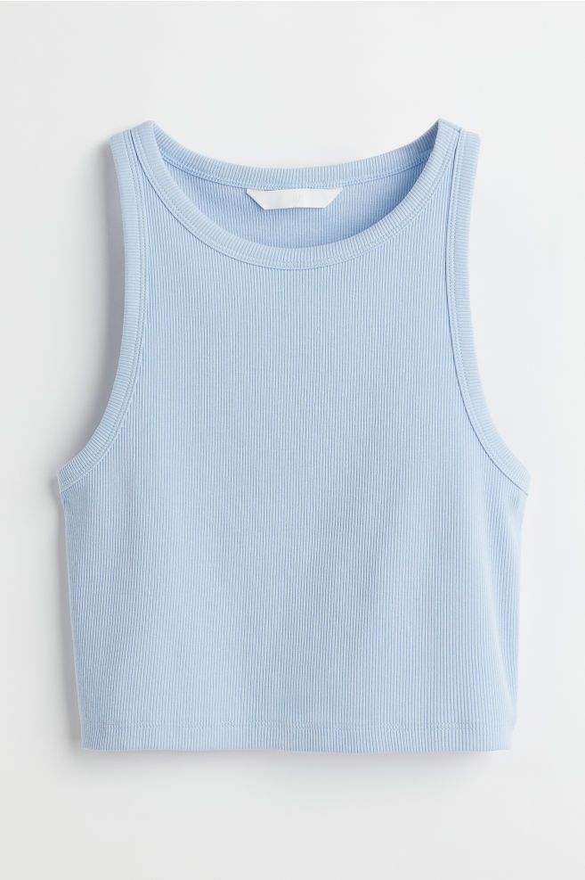 Fitted, crop tank top in ribbed cotton jersey. Narrow cut at top with a racer back. | H&M (US + CA)