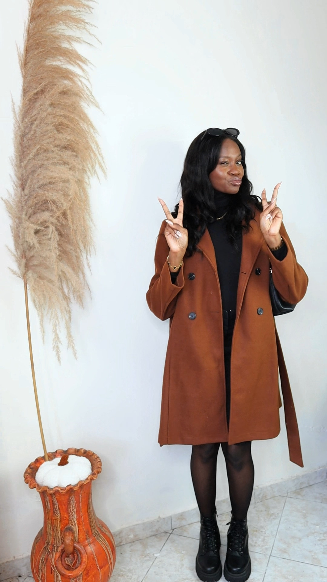 Serving warm tones and comfy layers this season! This oversized sweater + boots combo is a fall essential. 🍁 Shop my cozy vibes through the link in bio!" #LTKFall #FallOOTD