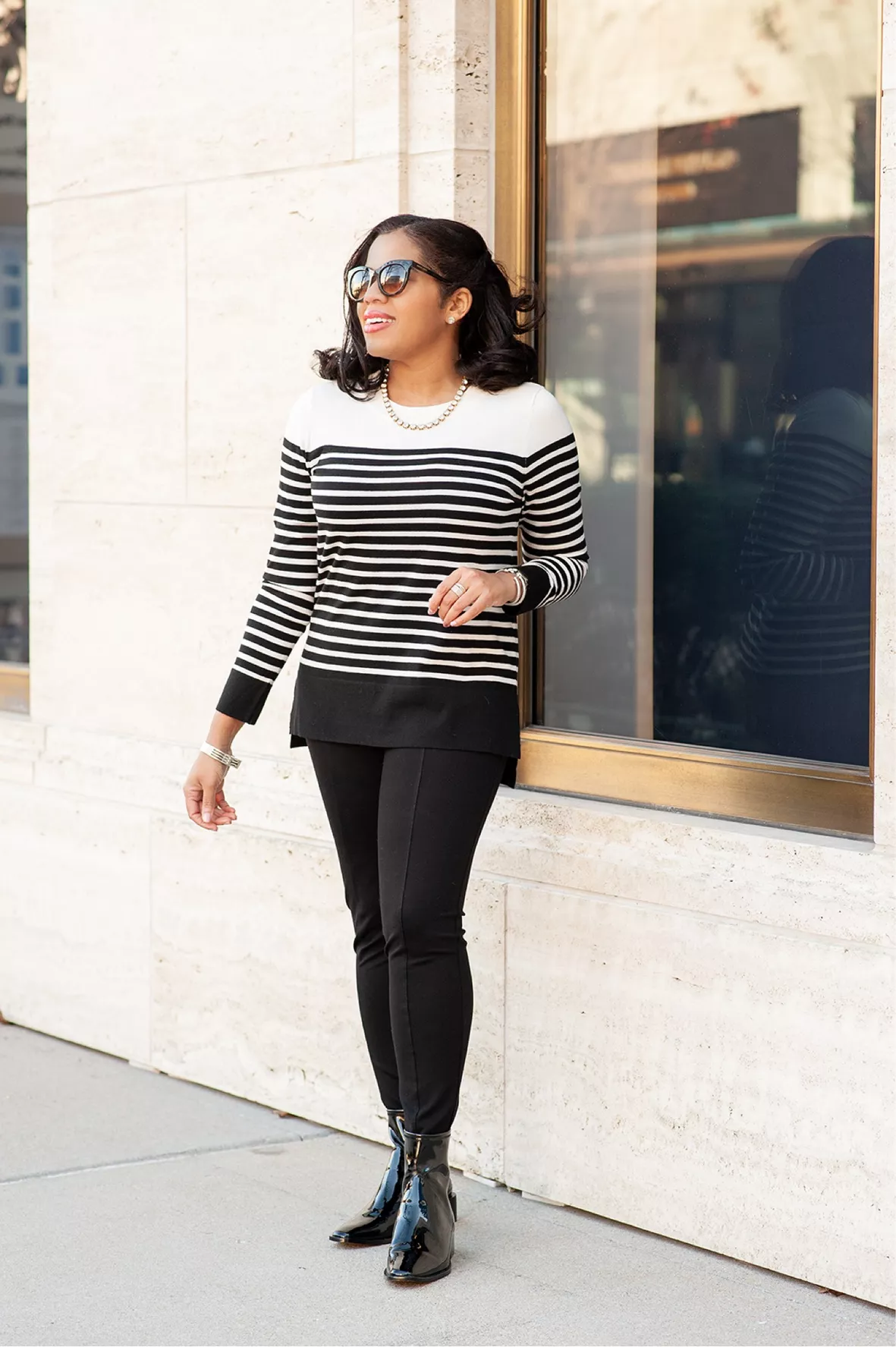 How to Style a Black and White Striped Sweater with Leggings