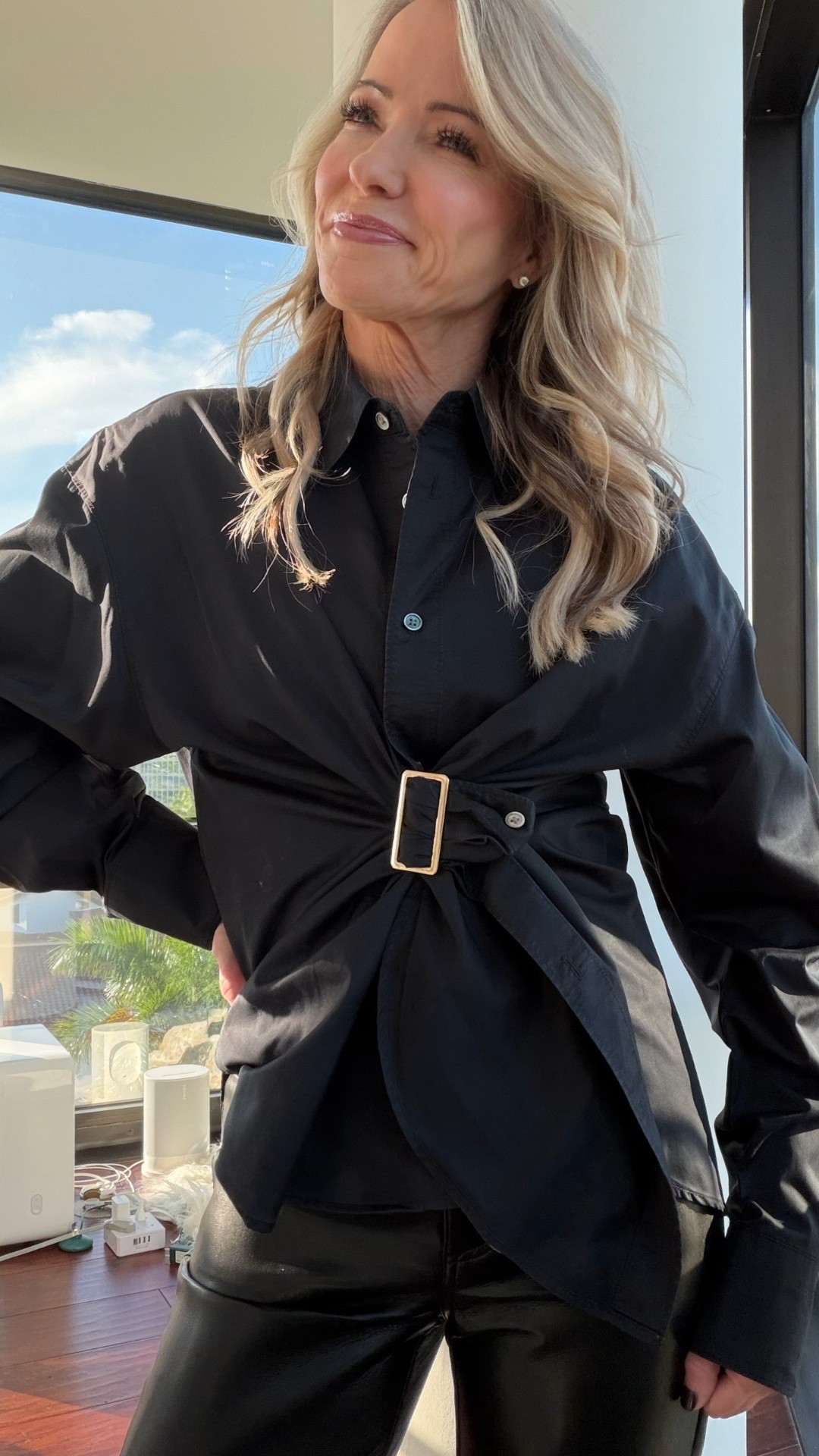 A classic button-down, styled smarter.
This buckle hack creates instant structure and elevates the entire look.

#LTKHoliday #LTKootd #LTKOver40