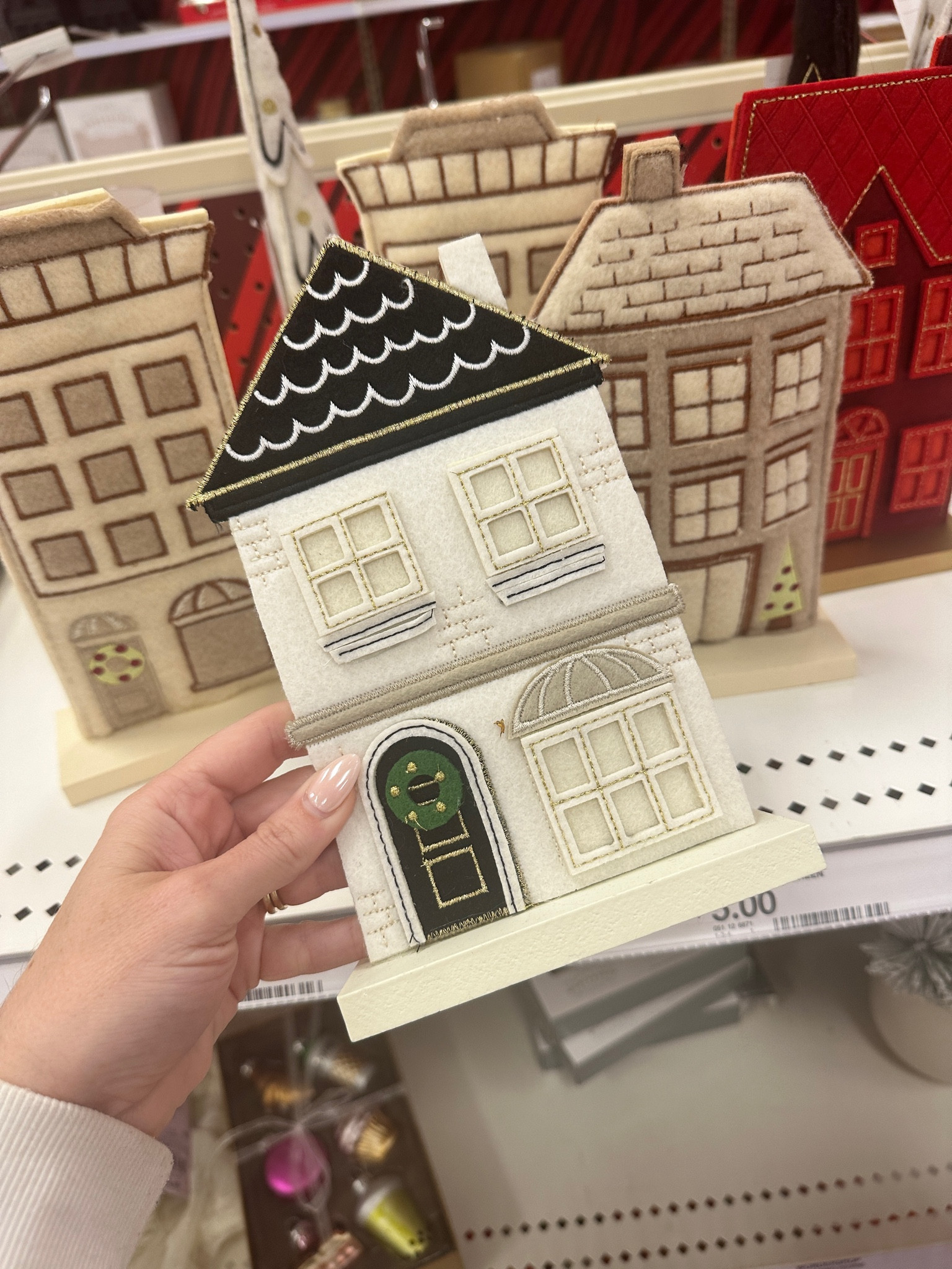 Cute fabric Christmas village houses and buildings 

#LTKHome #LTKHoliday