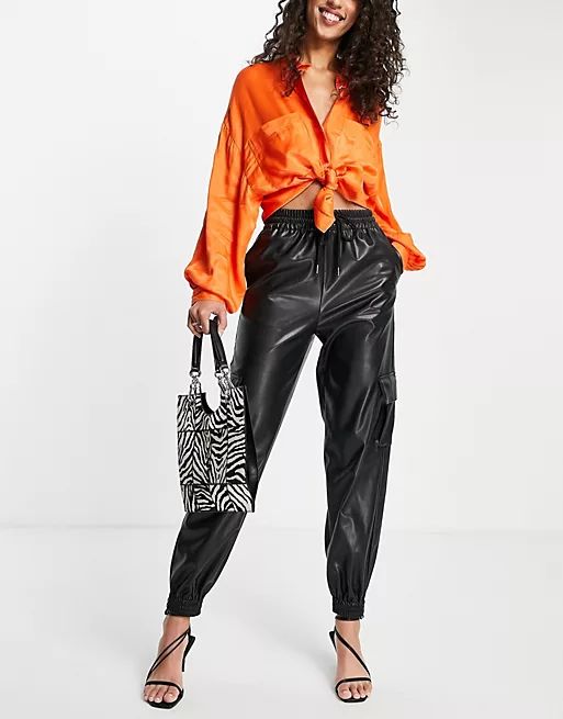 Topshop faux leather sweatpants with utility pockets in black | ASOS | ASOS (Global)