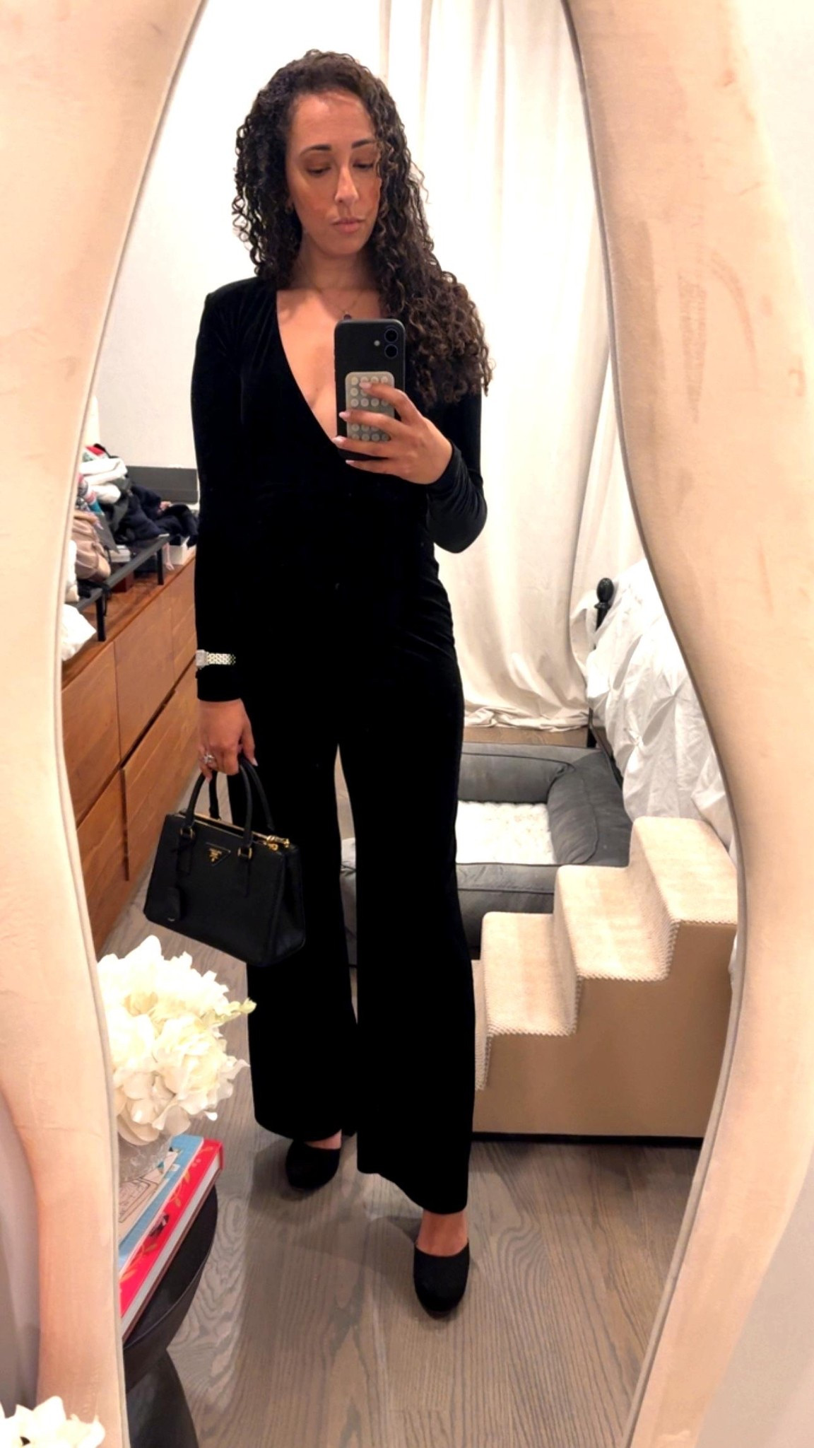 Amazing velvet jumpsuits. Just sexy enough with the deep plunge. Paired with my favorite little product bag and platform pumps. ￼

#LTKOver40 #LTKgrwm #LTKootd