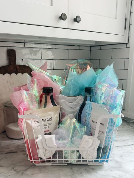 Color coordinated gift basket for a gender reveal! 🤍

#LTKBump #LTKBaby #LTKFamily