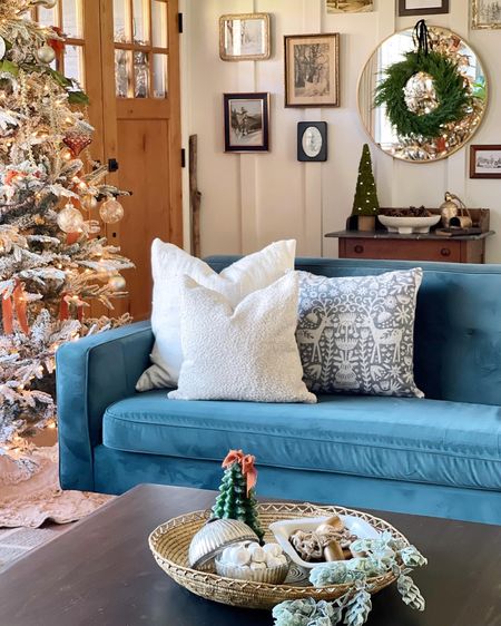 Christmas decor in the living room! Love this cozy Sherpa pillow and fun coffee table decor  

#LTKSeasonal #LTKHoliday #LTKhome