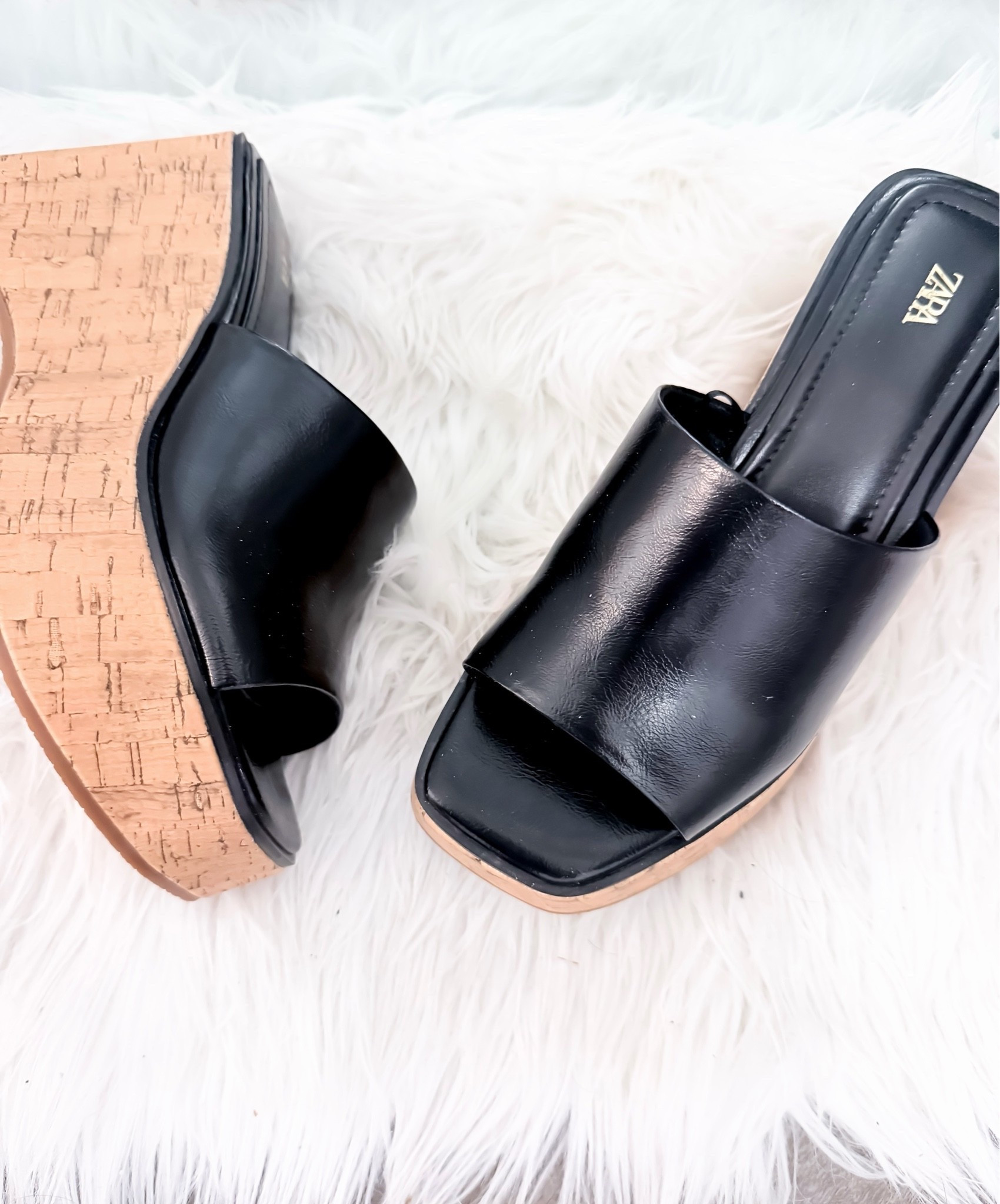 The perfect throw-on-and-go shoe. These black cork wedge slip-on mules are super comfortable and instantly make any outfit look elevated. This will be my summer staple I’ll be wearing on repeat. 

#LTKStyle #LTKFinds #ZaraStyle #EverydayChic #SummerStyle #NeutralFashion #OOTD #StyleInspo @Zara