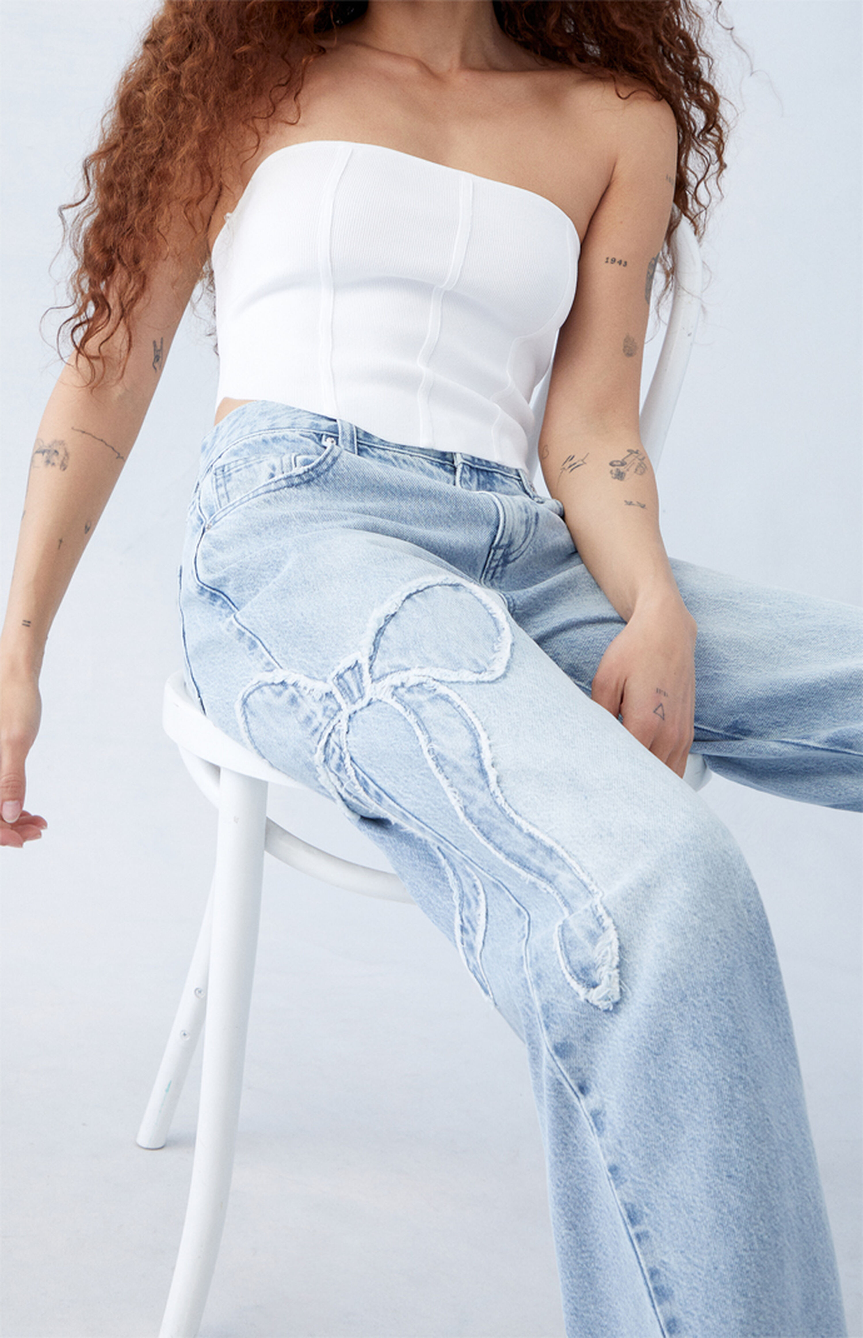 PacSun Casey Light Indigo Bow Low Rise Baggy Jeans | PacSun
