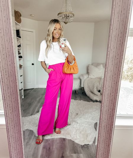 Sized up to a large in the crop top. Tucked bottom of top under in my sports bra for this look. I recommend sizing up one size in the pants. I Sized up 2 sizes to XL in these pink workwear pants. The waist is small.  Spring fashion. Resort wear. Spring break. Vacation outfits. Easter outfit. Graduation outfit. 

#LTKsalealert #LTKFind #LTKworkwear