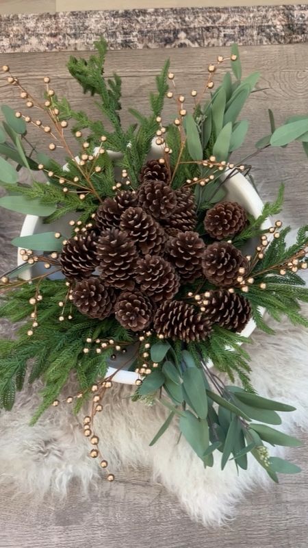 Here’s a simple holiday centerpiece that looks gorgeous for the holidays!  I am linking the exact Afloral stems and also look for less versions!  This is the large bowl from Pottery barn and it is huge!  I’m linking it here and a smaller version. 

I used 3 pine, 3 eucalyptus and 5 berry stems in this arrangement .

#LTKstyletip #LTKhome #LTKHoliday