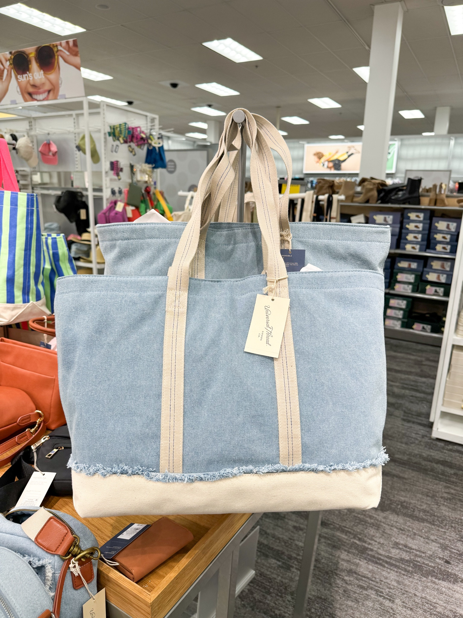 from the target app:

Whether hanging out with friends or running errands, carry your belongings in style with this Tote Handbag from Universal Thread™. This cotton handbag features an unstructured shape with ribbed detailing on the base for a chic look. Complete with magnetic closure on the main compartment, it opens to reveal a spacious interior with accessories pockets to keep your necessities neatly organized. Plus, the double strap and handle make carrying it super convenient and comfortable.


#LTKstyletip #LTKitbag #LTKfindsunder50