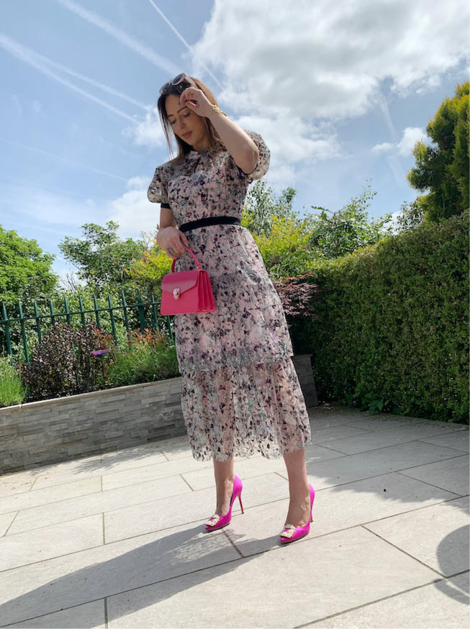 Floral maxi dress, puff shoulder, black belt, pink handbag, pink high heels, buckle heels, white sunglasses 

#LTKstyletip #LTKSeasonal #LTKeurope