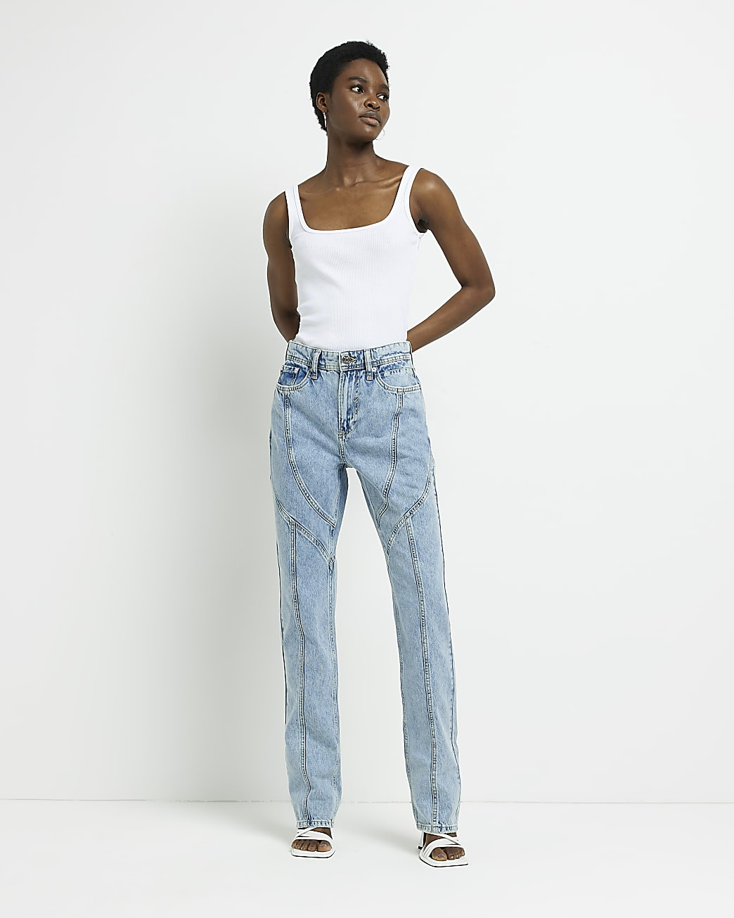 Blue high waisted seamed straight leg jeans | River Island (US)