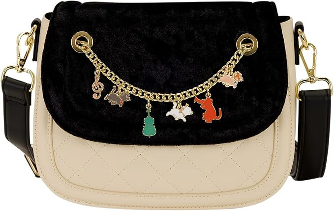  

 Disney… but make it classy 🖤✨
This quilted crossbody with the subtle character charm chain is such a beautiful way to add magic without going full theme park mode 🐭

Perfect for cruise dinners, park nights, or everyday Disney style.
Linked on my LTK 🤍
