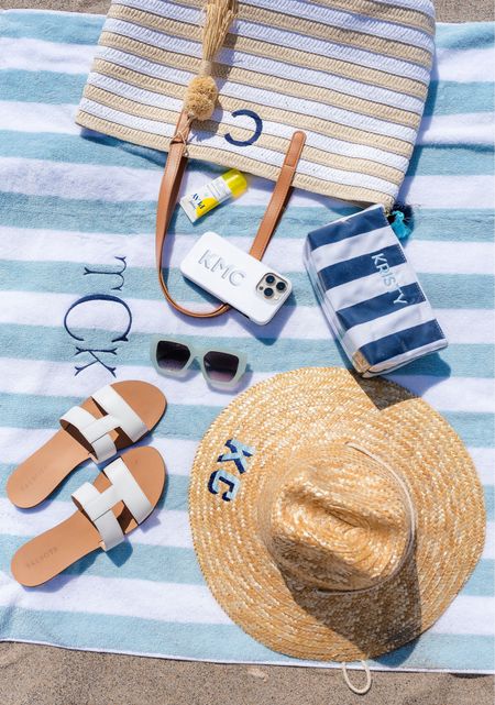 Beach essentials 🏖️ striped cabana beach towel, beach hat, beach bag tote, waterproof pouch, blue sunglasses, white sandals (similar linked) phone case

#LTKswim #LTKitbag #LTKSeasonal