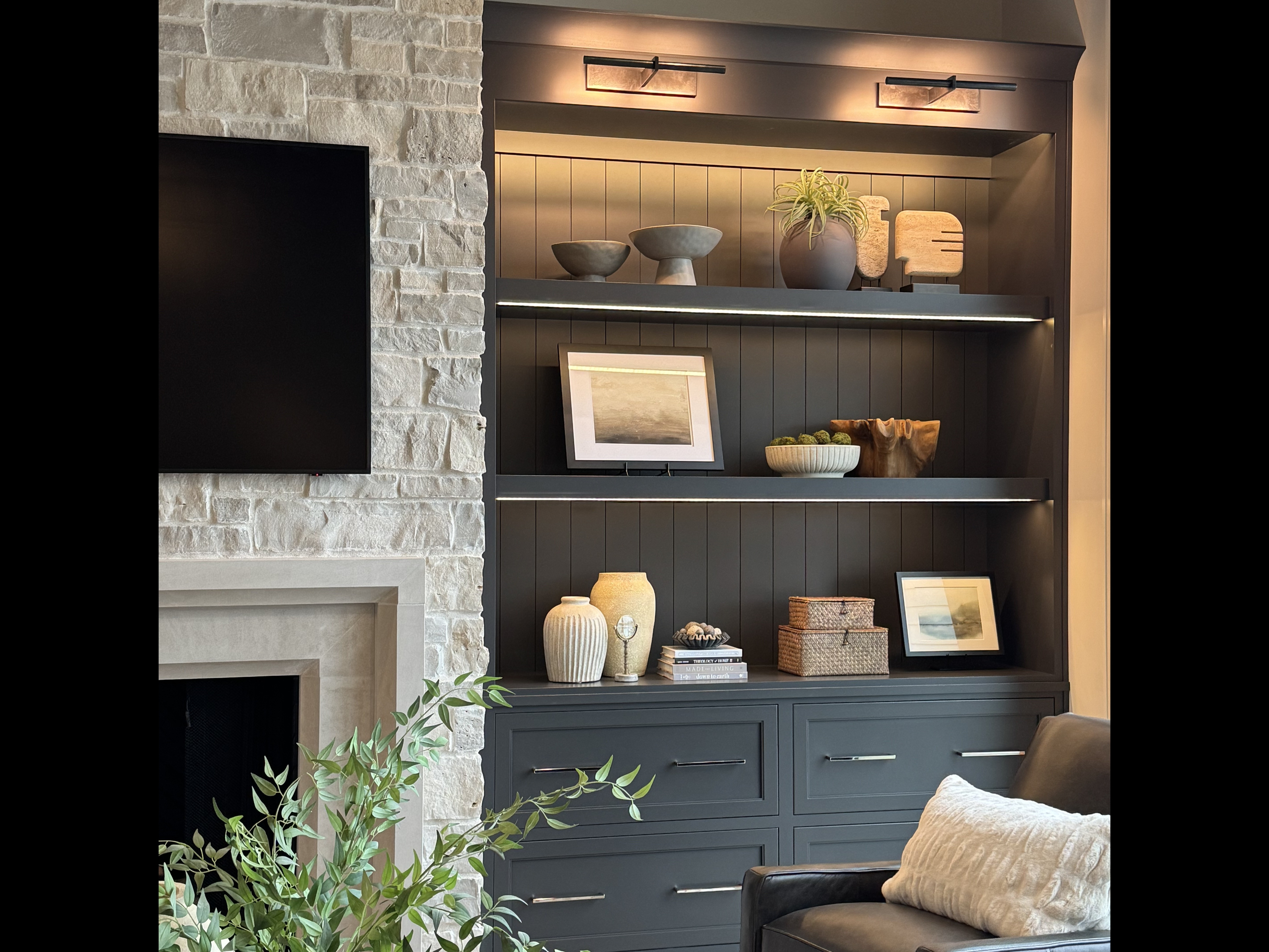 Unique pieces add character to this built in. #living room #renovation #decor 

 #LTKHome