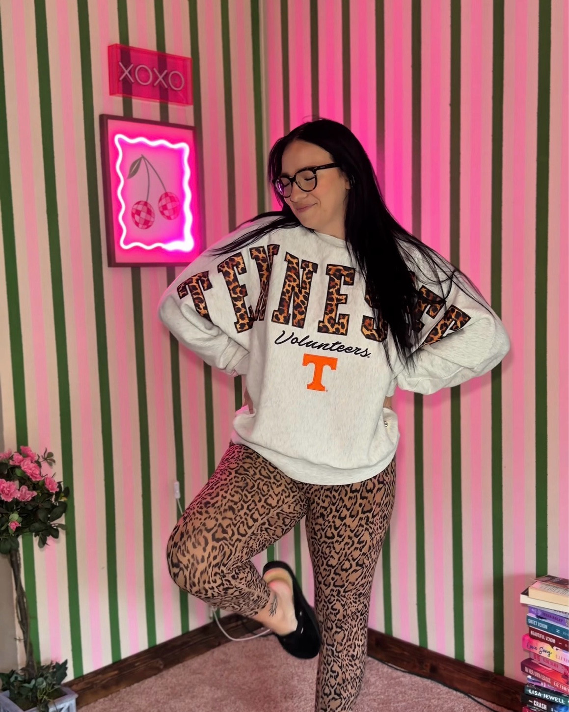 Serving cozy Tennessee game day energy with a side of leopard print because neutral is not in my vocabulary 🧡🐆 This oversized Vols sweatshirt + bold leggings combo is the kind of comfy outfit that still looks put together for coffee runs, errands, or football Saturdays. ✨ #LTKStyle #LTKFinds #GameDayStyle #TennesseeVolunteers #CozyFits #LeopardPrintStyle

#LTKootd
