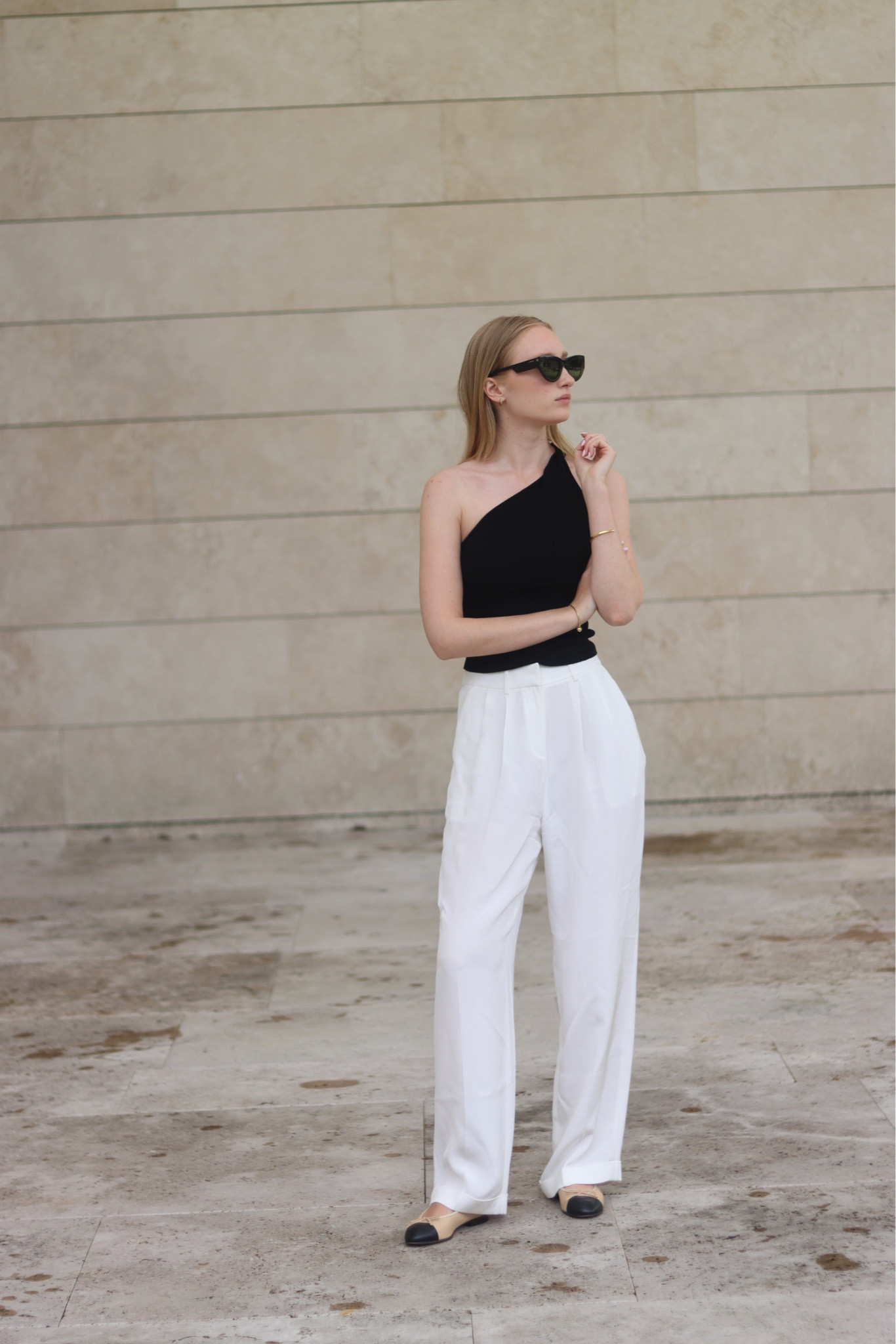 Monochrome outfit 

Black one shoulder top, black top, silk trousers, white trousers, wide leg trousers, black sunglasses, cat eye sunglasses, beige ballerinas 

#LTKstyletip #LTKSeasonal #LTKeurope