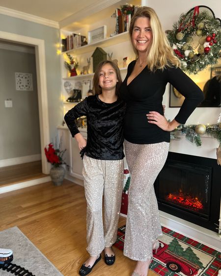 We are both holiday party ready! My daughter loved my sparkly pants so much, that we got her a matching pair! #holidaypartyready #mommyandme #twinningiswinning

#LTKSeasonal #LTKHoliday #LTKkids