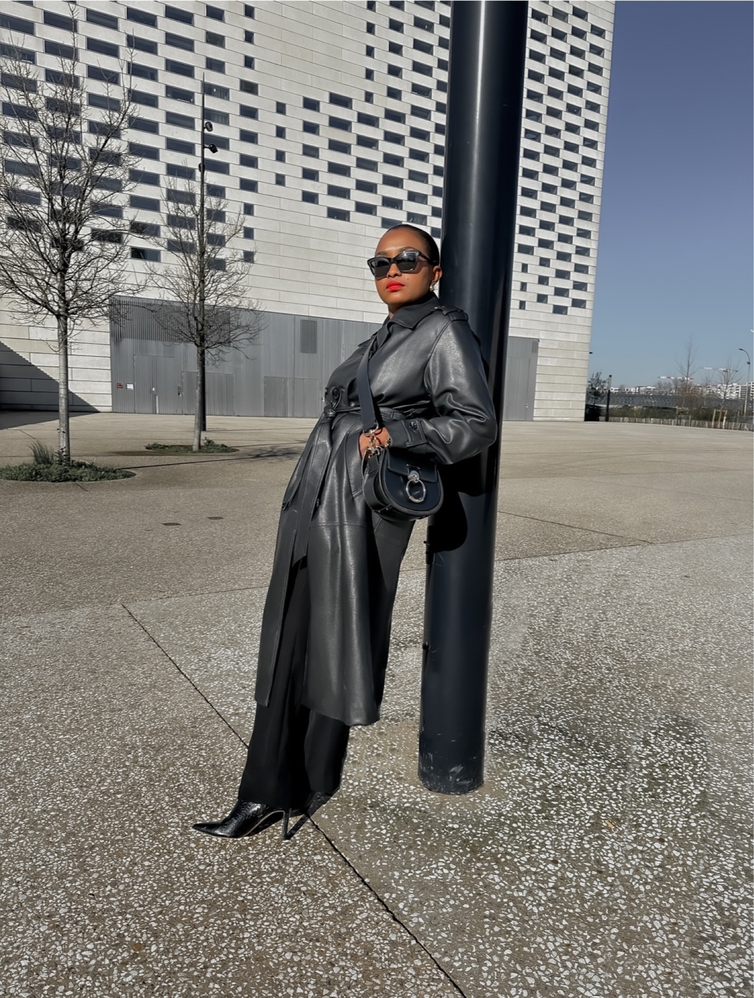 Black faux leather trench coat, minimal chic outfit, all black outfit 

#LTKMostLoved #LTKstyletip #LTKworkwear