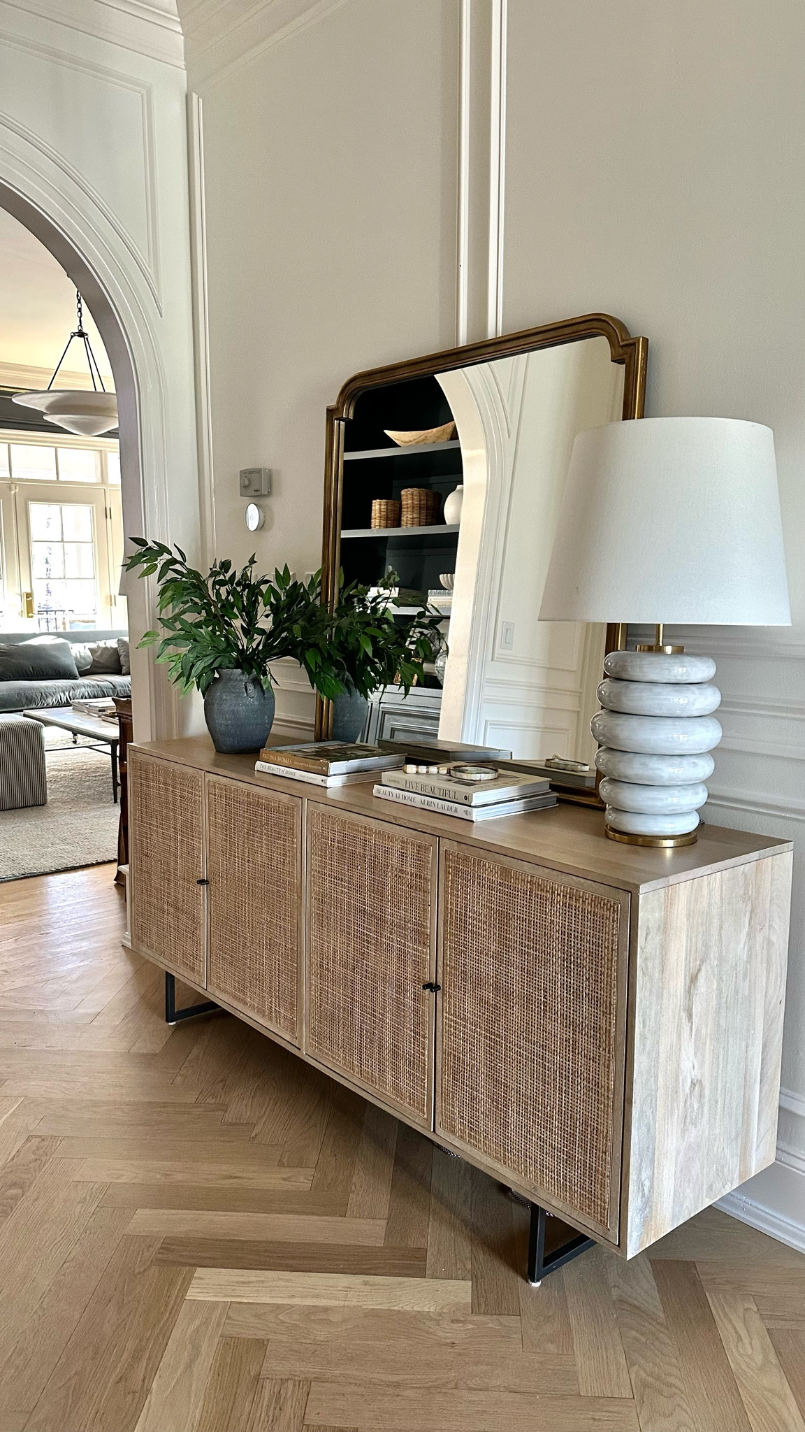 Hallway table. 

Delores Cane Console Table / Hannah Sideboard and Phoebe Stacked Table Lamp

#LTKStyleTip #LTKHome