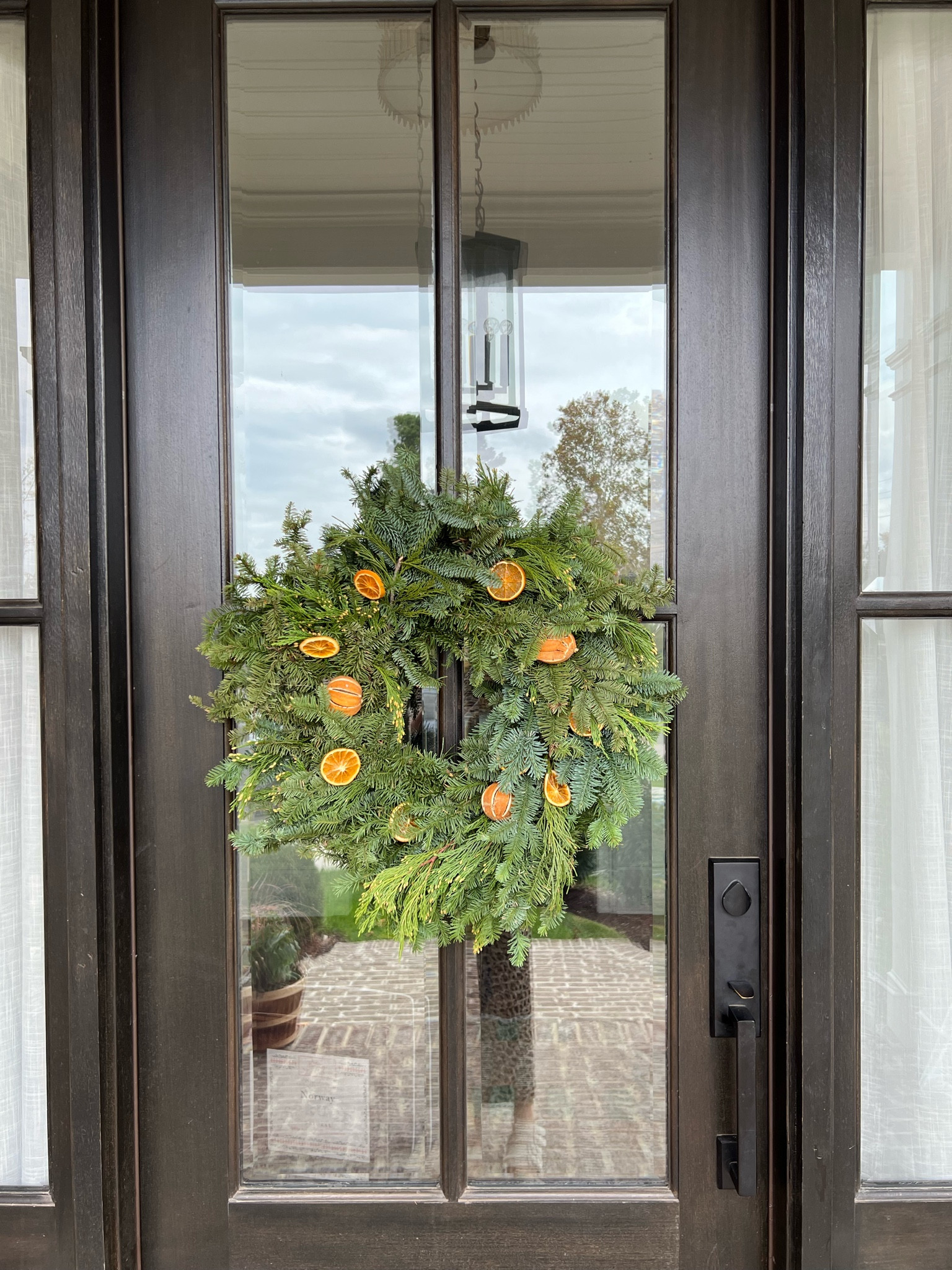 Just got this gorgeous fresh wreath with dried oranges 🍊 

#LTKHome #LTKSeasonal #LTKStyleTip
