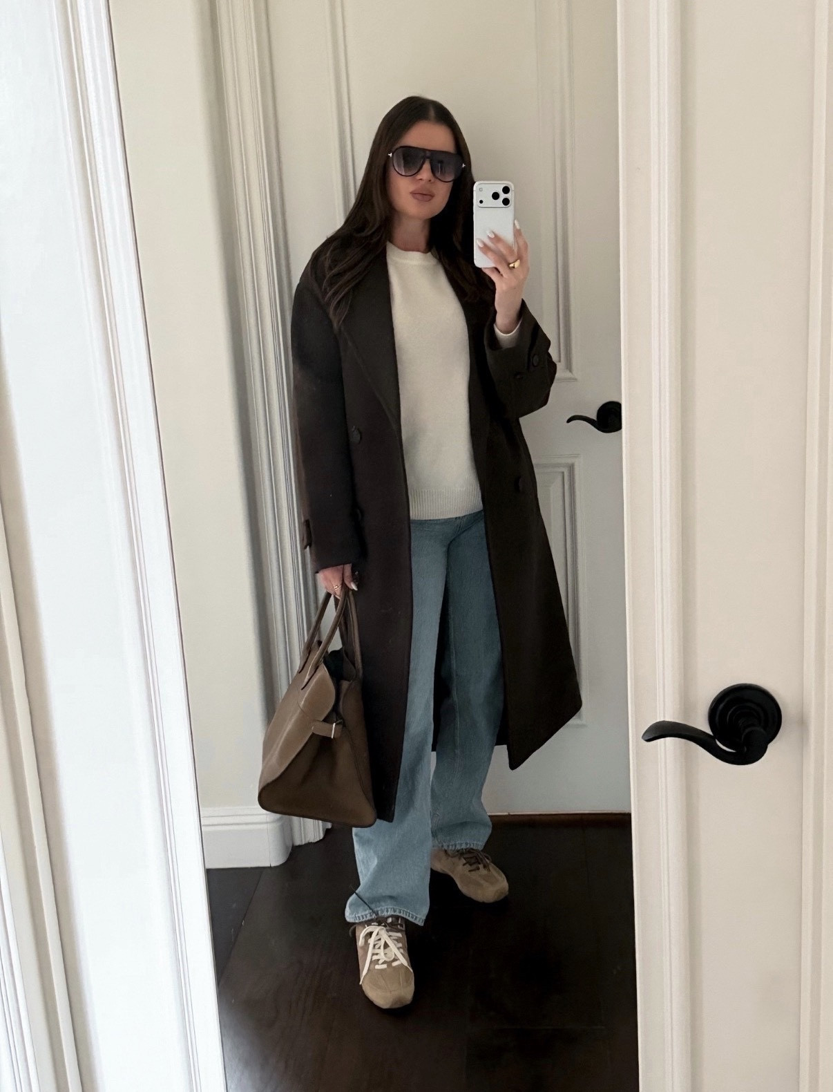 Styling this espresso brown coat with straight leg jeans, cashmere sweater and suede sneakers 
#espresso #brown #darkbrown #chocolatebrown #coat #cashmere #sweater #beige #cream #therow #zara #margaux #suede #sneakers #miumiu #aviators #newbalance 
#wintercoat 





#LTKCyberWeek 

#LTKFindsUnder100 #LTKSeasonal #LTKFindsUnder50 #LTKSaleAlert #LTKWorkwear