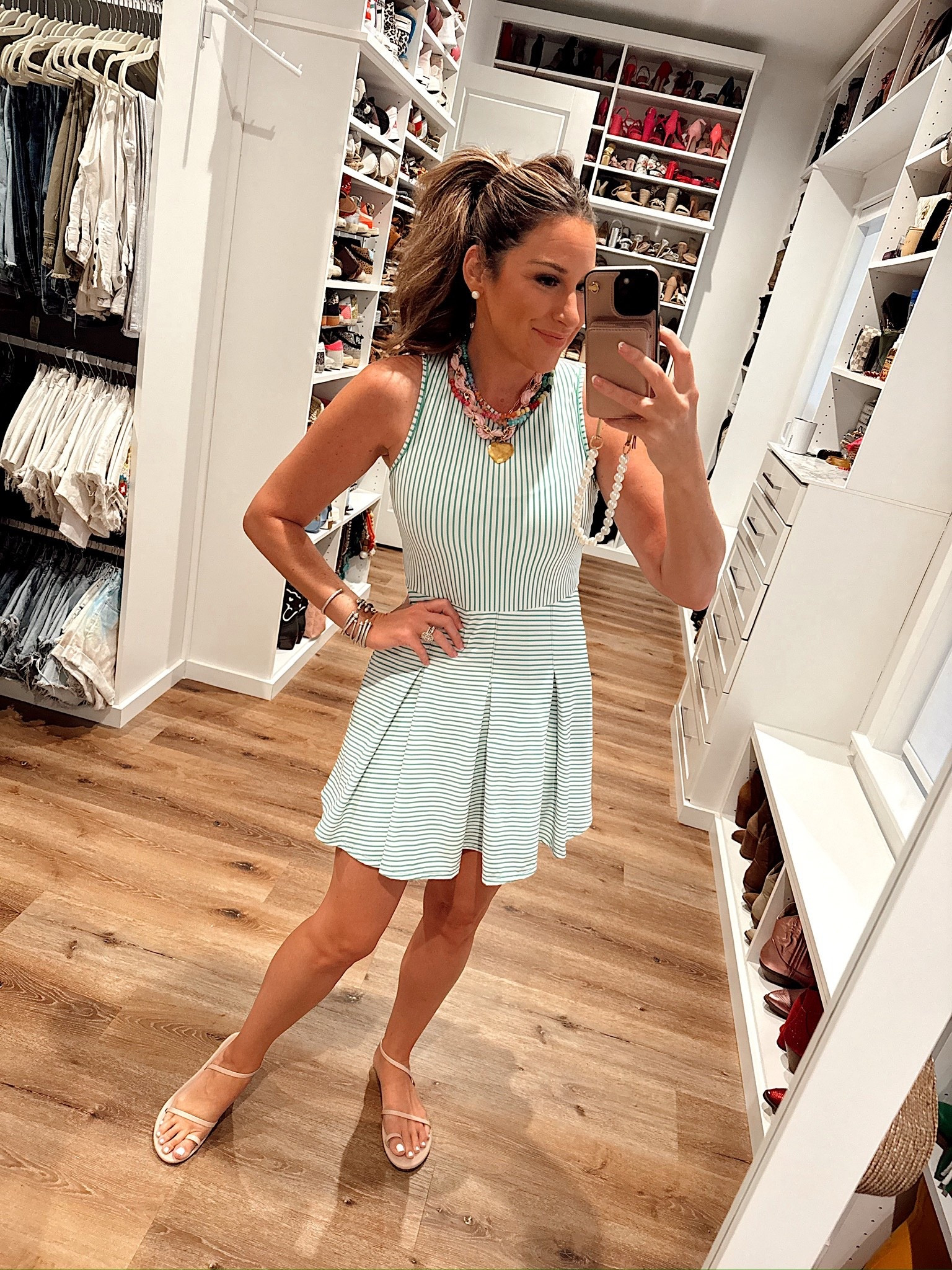 In a medium tennis dress, sandals, necklaces and accessories- fits tts.

#LTKStyleTip #LTKSeasonal #LTKActive