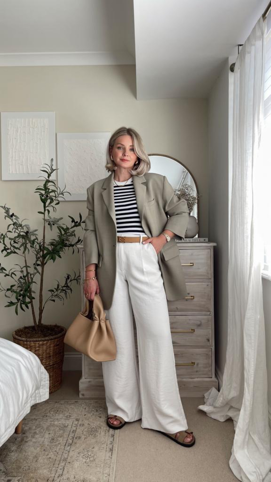 Abercrombie wide leg light beige trousers, mango striped vest top, light khaki oversized blazer, ego beige sandals & Loewe belt  

#LTKSeasonal #LTKeurope #LTKstyletip