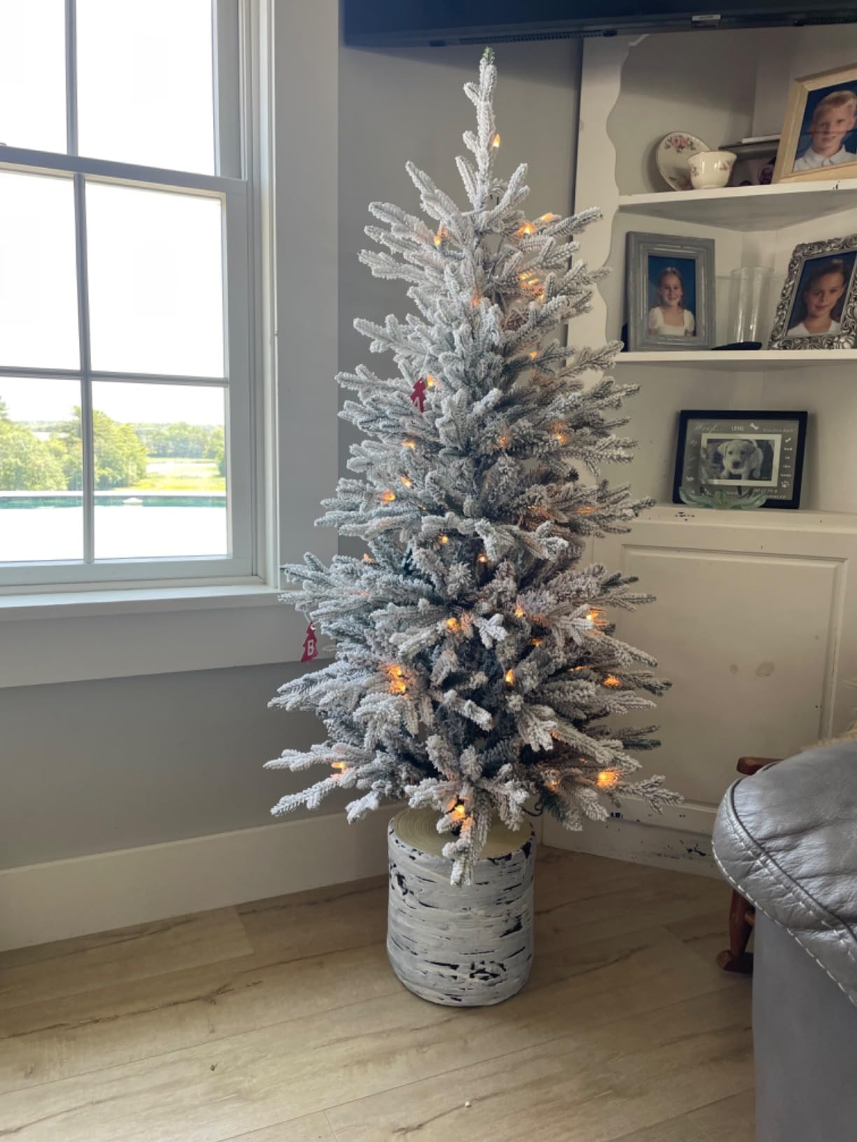 Puleo International 4.5 Foot Pre-Lit Potted Flocked Arctic Fir Artificial Christmas Tree with 70 ... | Amazon (US)