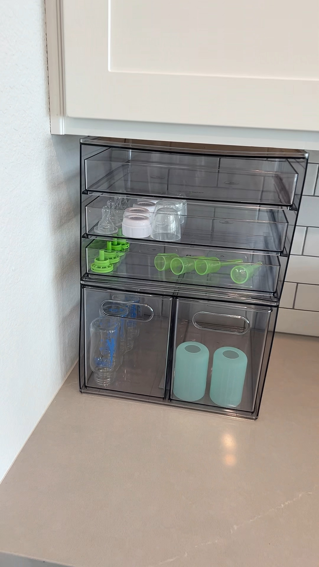 baby bottle organizer - fits perfectly under cabinet! watch how i organized  

#LTKStyleTip #LTKBaby #LTKHome