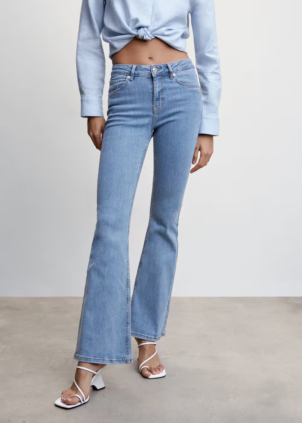 Medium-rise flared jeans  -  Women | Mango United Kingdom | MANGO (UK)