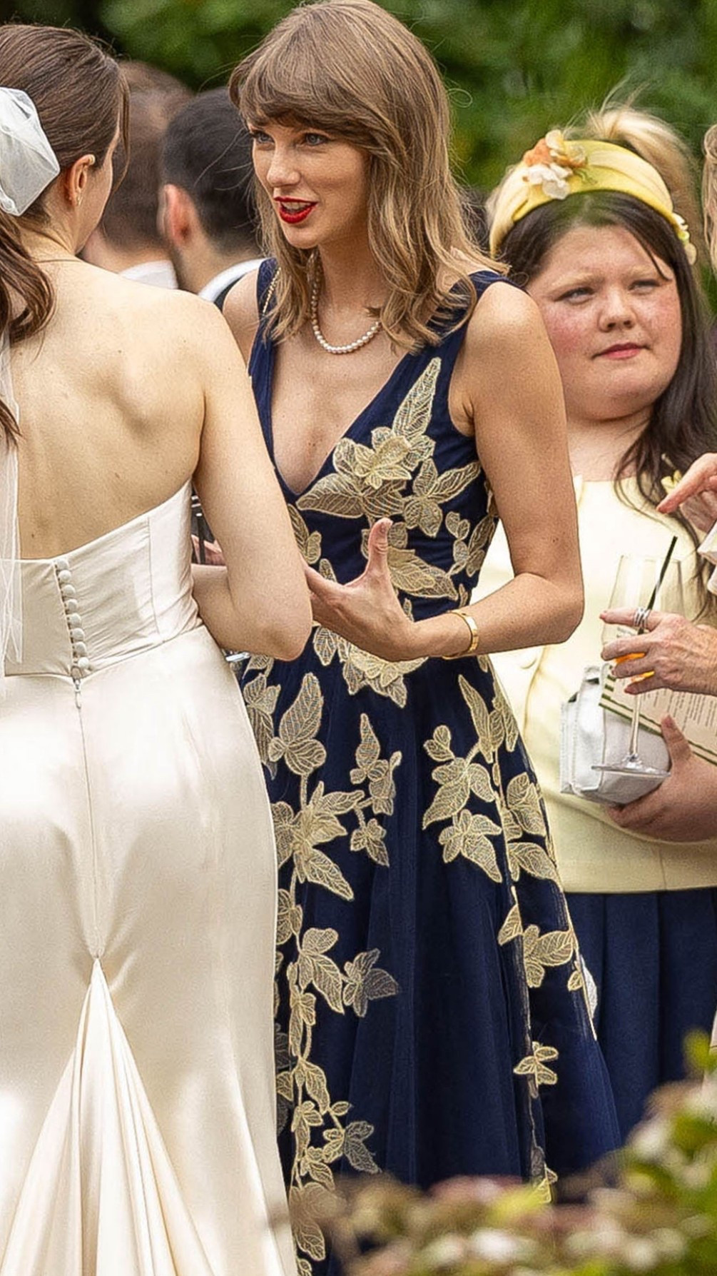 Taylor Swift wearing a  appliqué tulle gown Laura Sisk and Oli Jacob's Wedding August 16, 2026