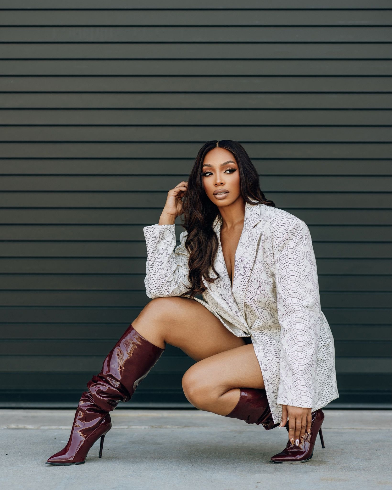 Feeling fierce in this bold, head-turning combo! 🐍 Rocking the ASHTIN oversized snake print blazer paired with the AMMO x AKIRA pleather shorts for that perfect mix of edgy and sleek. Completed the look with the AZALEA WANG Mitica patent slouch boots in burgundy, adding just the right touch of drama. I’m rocking a medium in everything! And to top it all off, I'm wearing Alien Goddess Eau de Parfum by MUGLER for that extra power move. 💥✨ Shop the full look on my LTK! #LTKfit #LTKunder100 #LTKshoecrush #EdgyVibes