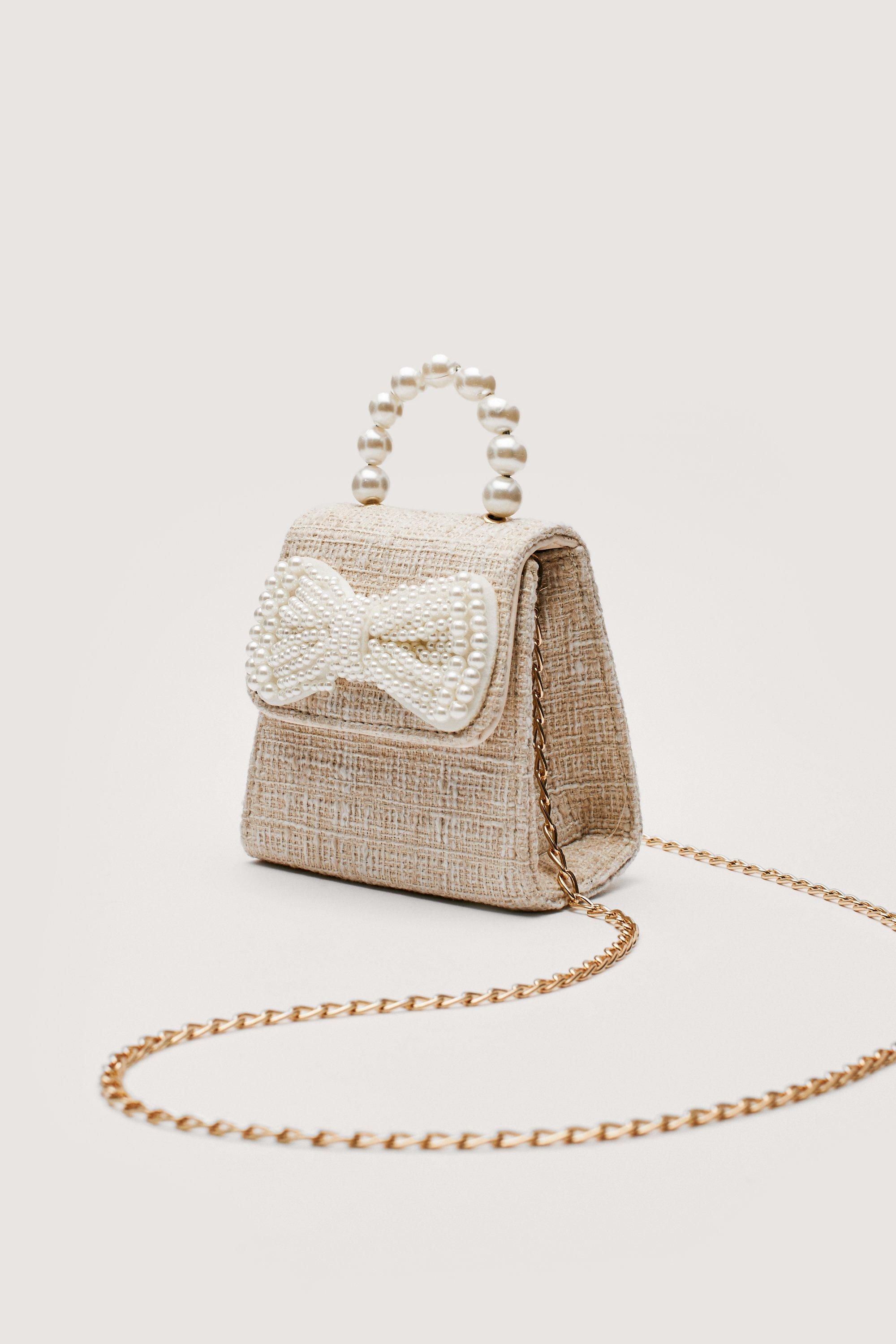 Woven Bow Detail Pearl Inspired Crossbody Bag | Nasty Gal (US)