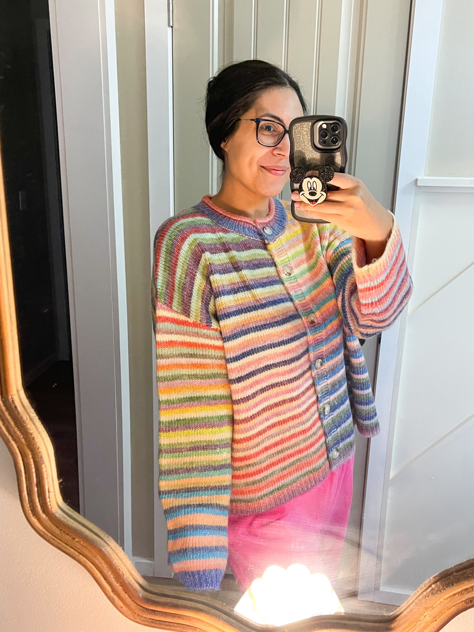 car line ootd! This rainbow knit sweater is sold out almost everywhere! Do not sleep on this happy cardigan 🌈✨ I’m 5’5 a little under 150 and I’m in my true size medium! 

#LTKSeasonal #LTKmomlife #LTKootd