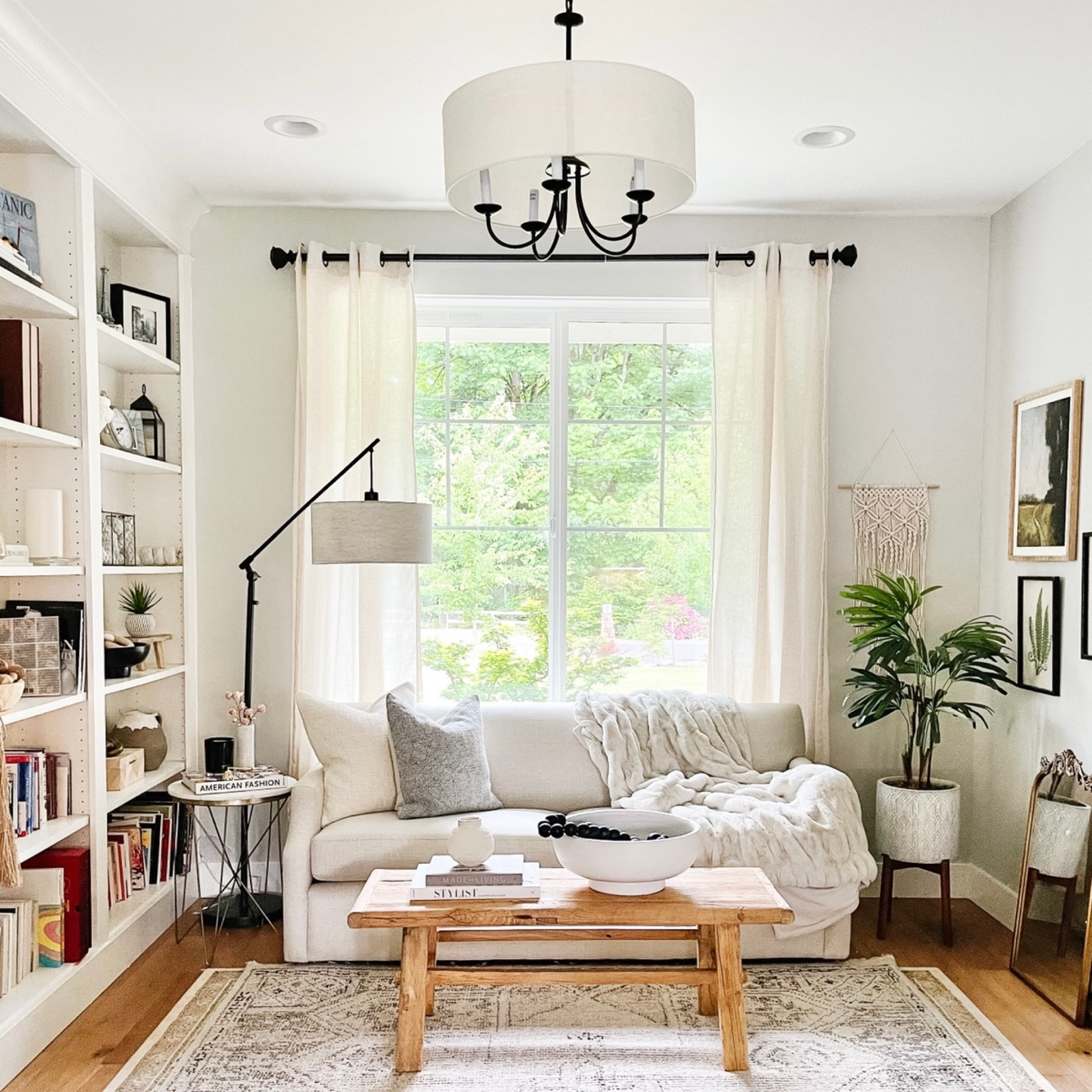 Our sitting rooms is one of favorite spaces in our home. From the reclaimed wood coffee table to the pottery barn settee to this beautiful woven hand knitted rug from Target x studio mcgee! It gives me all the cozy, modern rustic feels!

#LTKhome #LTKFind #LTKstyletip