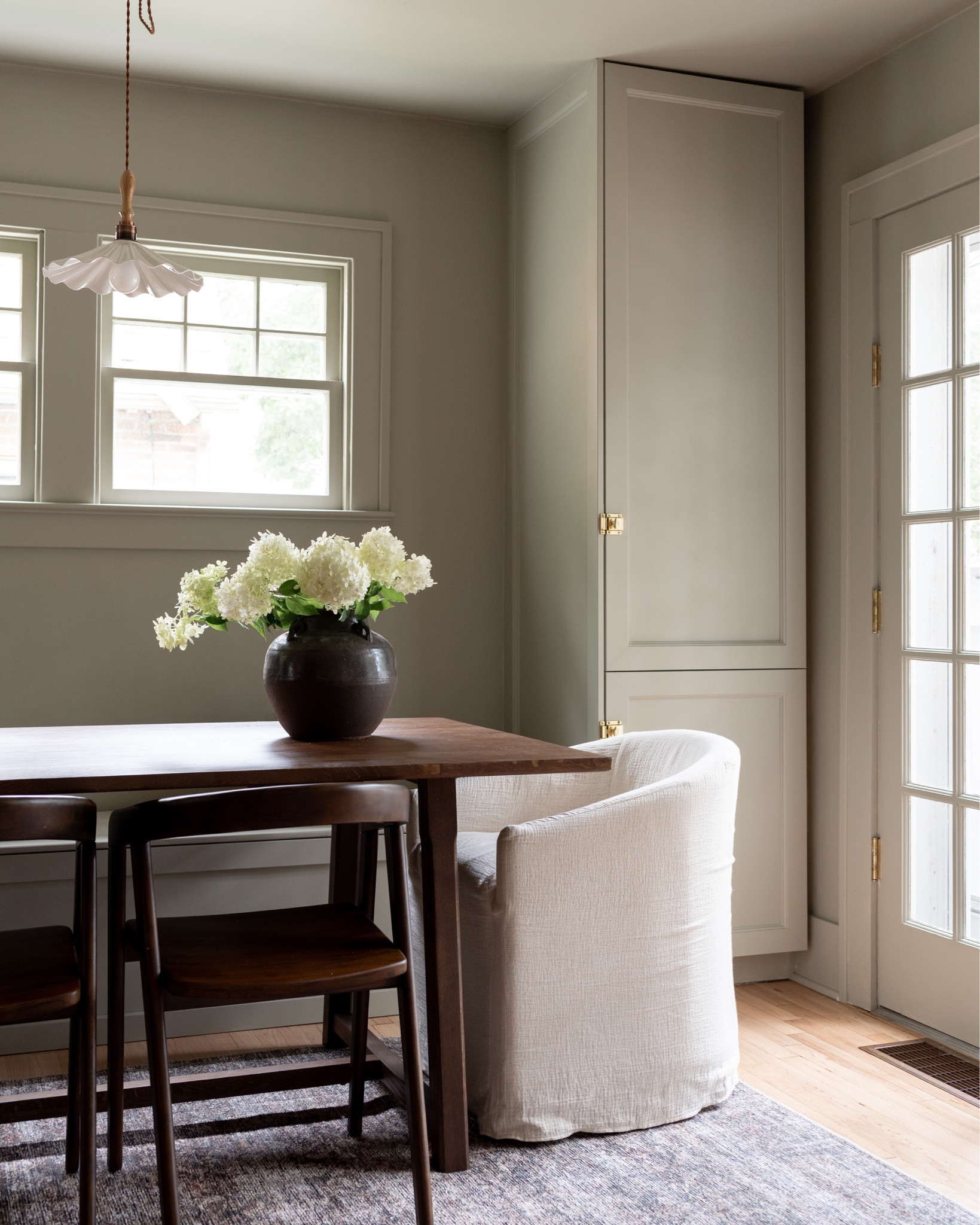 Dining room inspiration- barrel back dining chairs, rounded back dining chairs, large wood dining table, dining room area rug. 

#LTKSeasonal #LTKhome