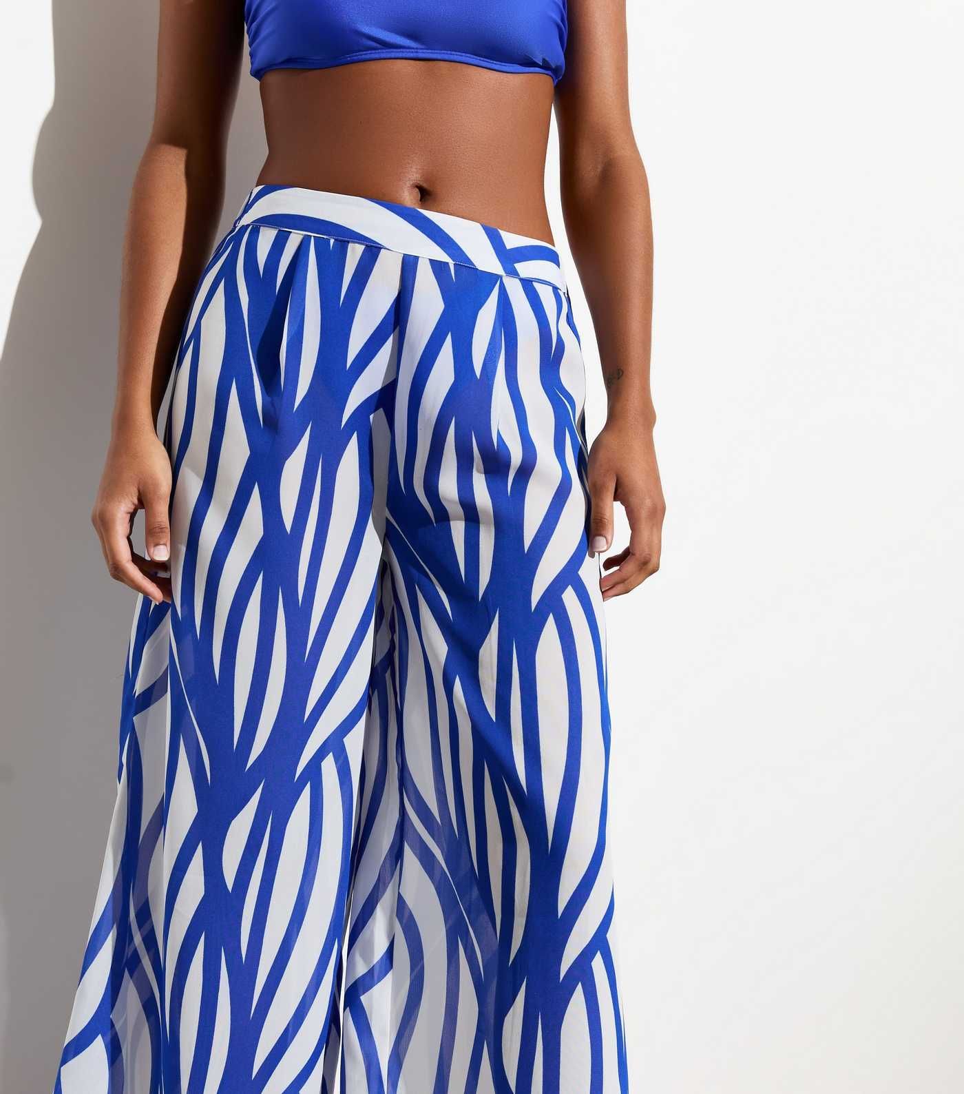 Blue Abstract Line Wide Leg Trousers
						
						Add to Saved Items
						Remove from Saved Item... | New Look (UK)