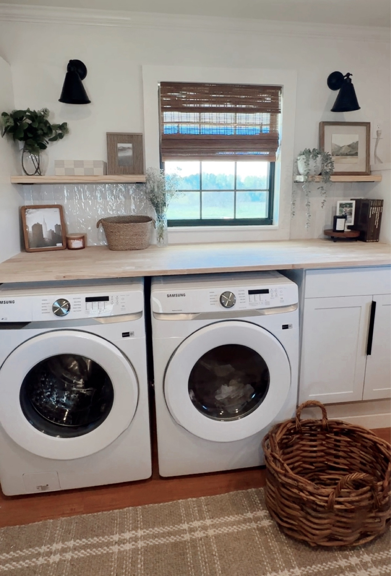 Our laundry room renovation turned a useless, dirty room into a beautiful (AND FUNCTIONAL) space! Having a beautiful space makes doing laundry so much better! 

#LTKSeasonal #LTKhome #LTKfindsunder50