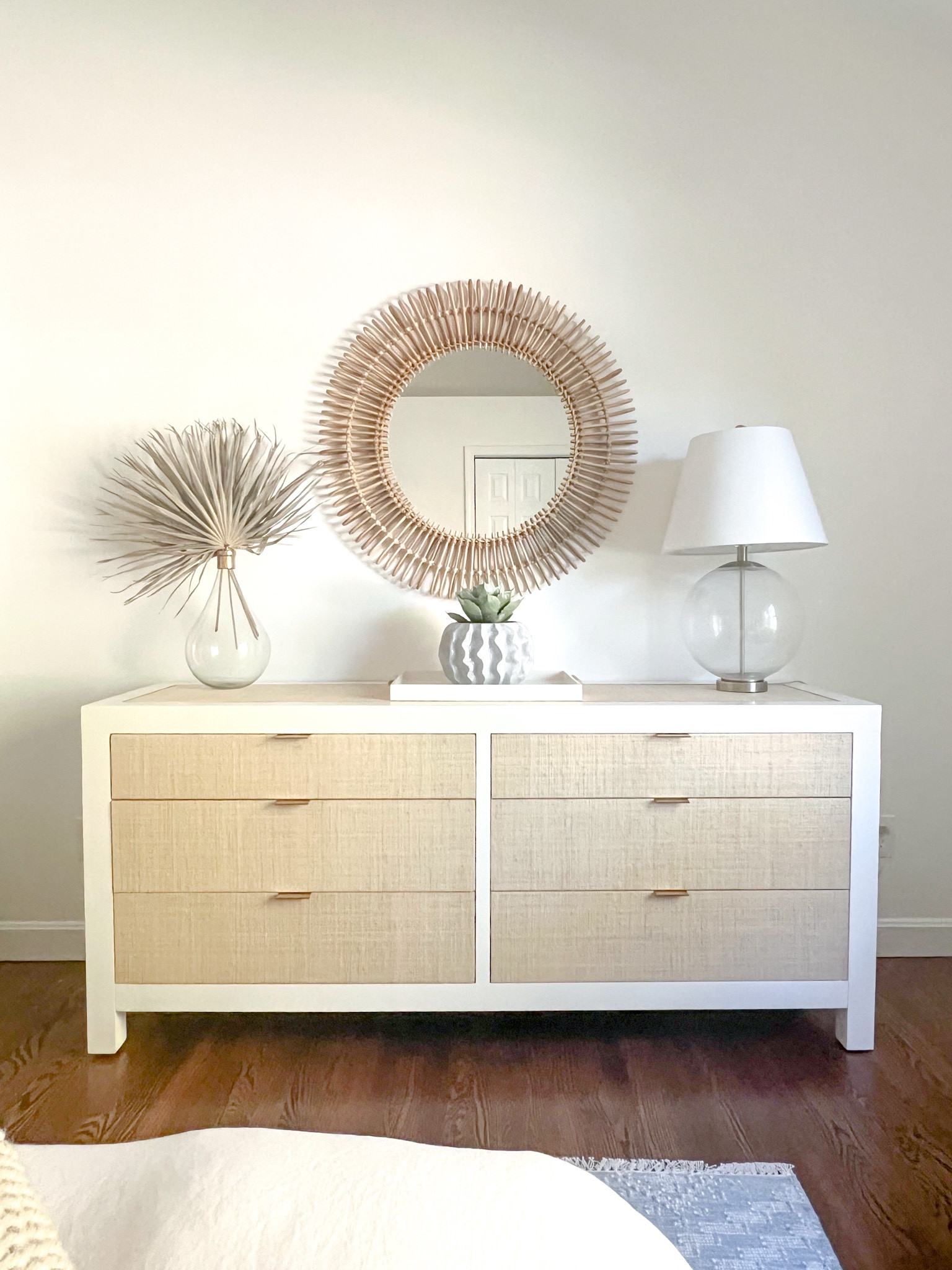 My guest room is very much a work in progress, but this dresser is one of the most recent additions and it's currently on sale. Definitely a splurge but I couldn't resist this gorgeous piece after pining over it for years, and I love all of the storage that it offers! Mirror is discontinued but I linked some similar options!
-
coastal home decor, coastal dressers, serena & lily dressers, six drawer dresser, woven dresser, white dressers, coastal bedroom furniture, dressers on sale, raffia dresser, beach house furniture, lake house furniture, primary bedroom dresser, round mirror, woven mirrors, bedroom mirrors, bedroom lighting, bedroom lamps, glass lamps 

#LTKSaleAlert #LTKHome