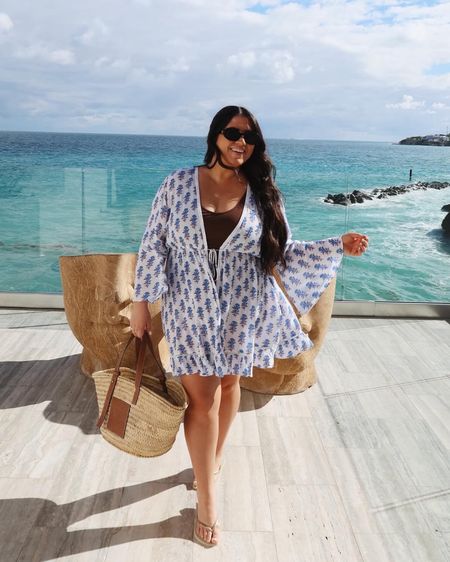 Cannot go wrong with this pretty print coverup under $100! 

#LTKSeasonal #LTKswim #LTKtravel