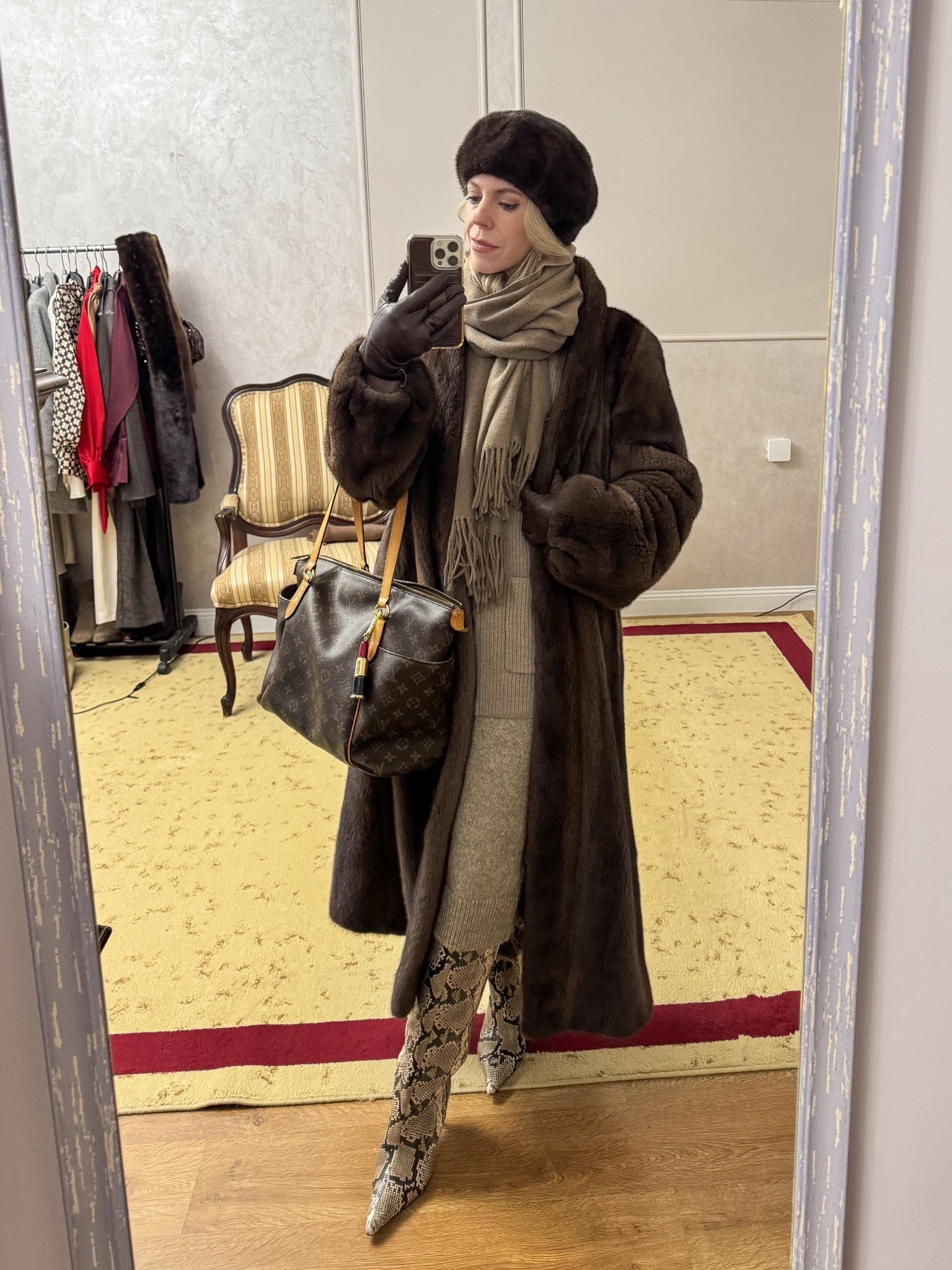Workwear ootd, office look, fur coat, fur hat, knit skirt, snakeskin boots, Louis Vuitton tote bag, style over 40

#LTKootd #LTKWorkwear #LTKOver40