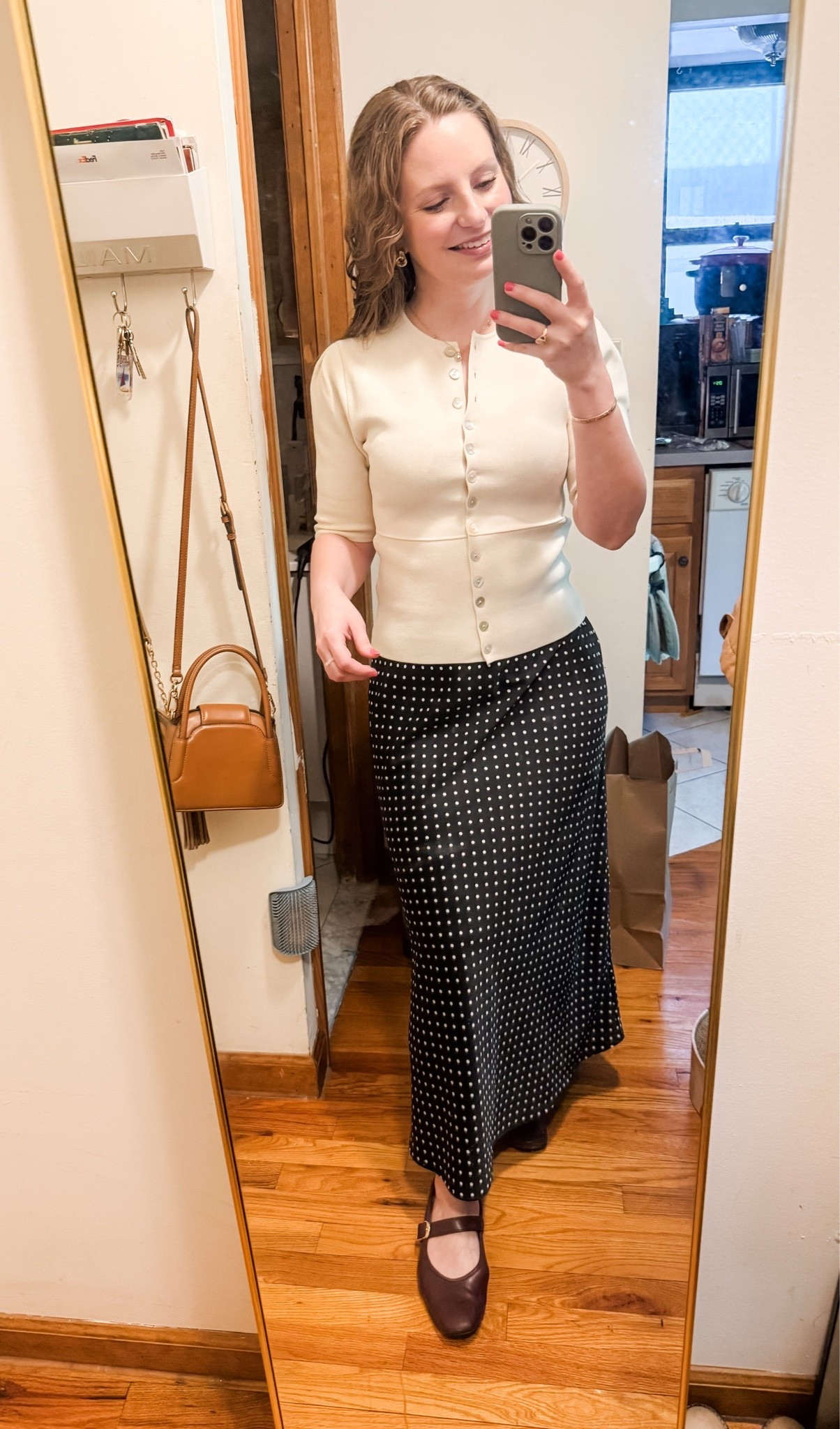 Loving polka dots this spring! A polkadot midi skirt is surprisingly versatile and can be paired with tees and sweaters, flats or heels for different looks. This outfit was easy and comfortable for an afternoon of accompanying and teaching!

#LTKdayinmylife #LTKootd #LTKSeasonal