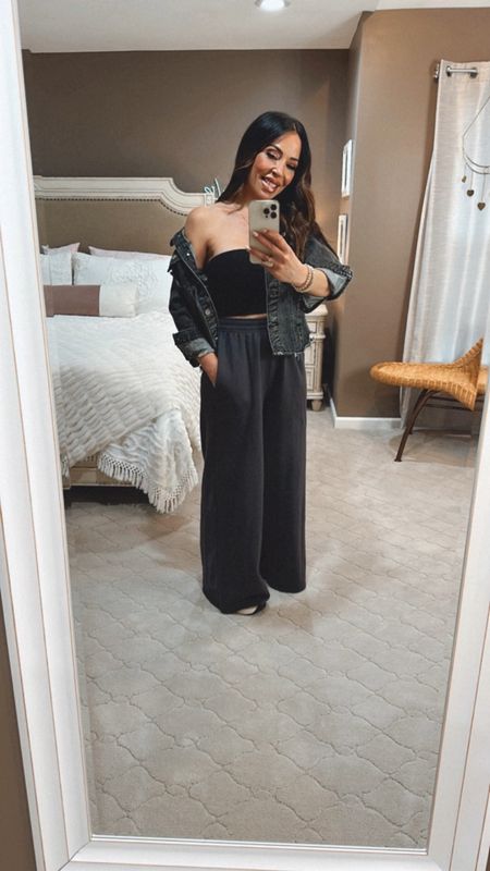 Wide leg joggers are all the rage. Yes, you can wear them all through spring! This pair looks designer, but they’re from Target! I love this edgy way of styling them with a tube top, denim jacket and platform sneakers! You don’t have to spend a lot. Everything I am wearing is so affordable. 🖤🖤🖤🖤🖤
#springoutfit #target #targetstyle #mytargetstyle 

#LTKover40 #LTKstyletip #LTKfindsunder50