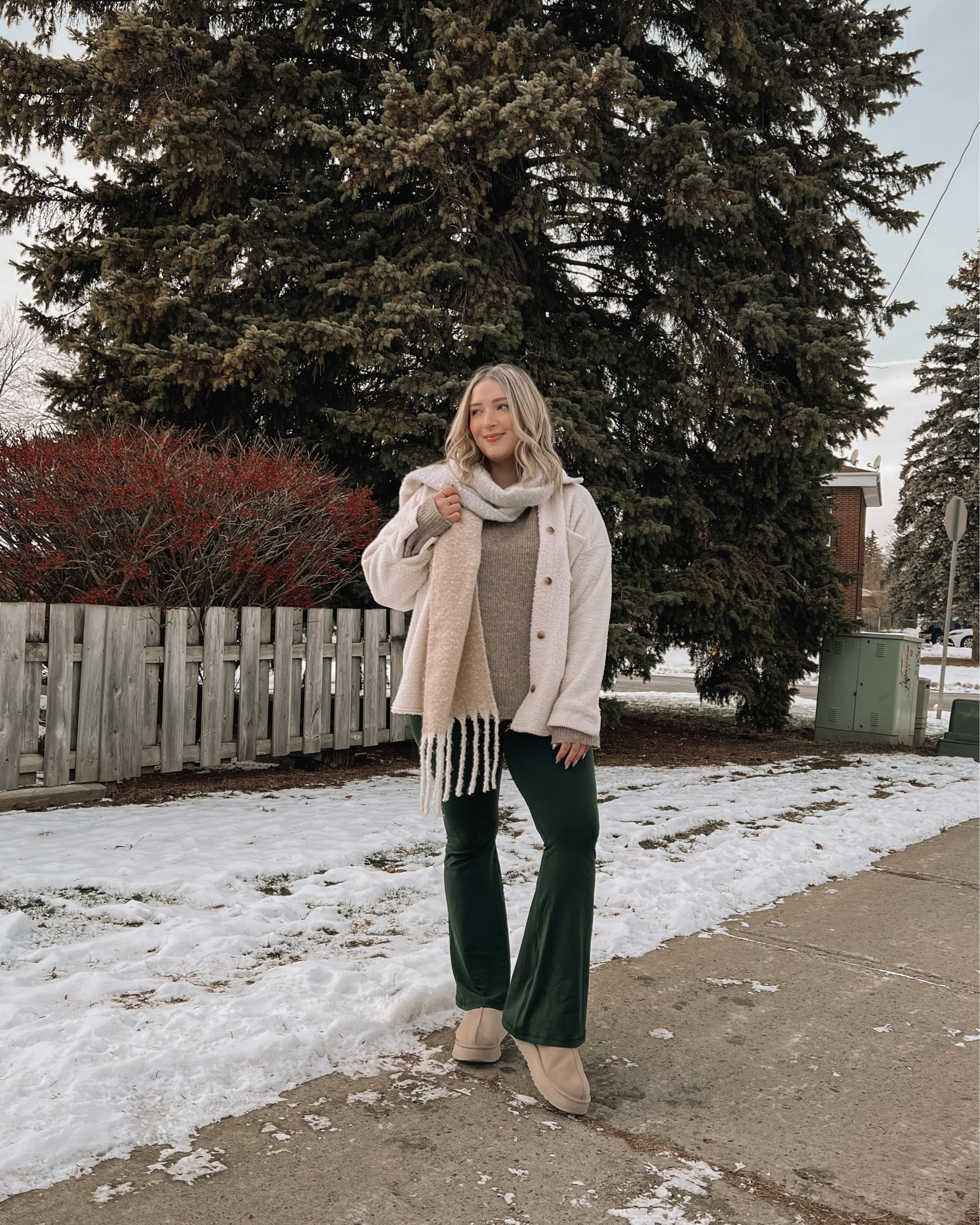 Cozy winter outfit - wearing my usual size L in the dark green flare leggings (SO comfy and 30% off!) and sized up to XL in the taupe sweater (60% off) for an oversized fit. My sherpa shacket is old but I found similar options! Ugg tazz platforms fit TTS

#LTKmidsize #LTKsale #LTKwinter